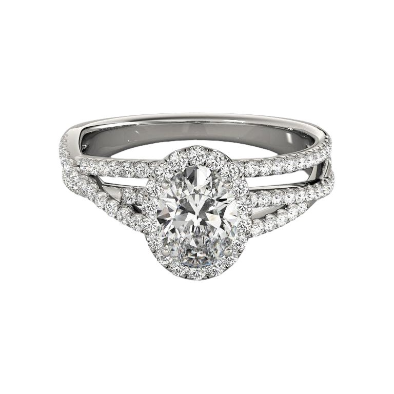 Anello con diamante ovale aureolato da 1.24 carati con tripla fascia di pavé, certificato GIA