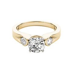Anello con diamante a tre pietre in oro giallo con castone rotondo da 1,24 carati certificato GIA