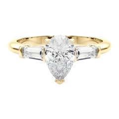Anello di diamanti a tre pietre con pera e baguette certificato GIA da 1,25 carati