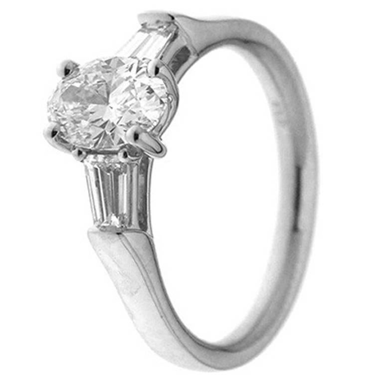 GIA Certified 1.25 Carat White Diamonds and Platinum Engagement Ring