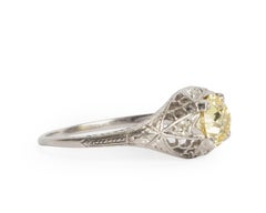 GIA Certified 1.25 Carat Yellow Diamond Platinum Engagement Ring
