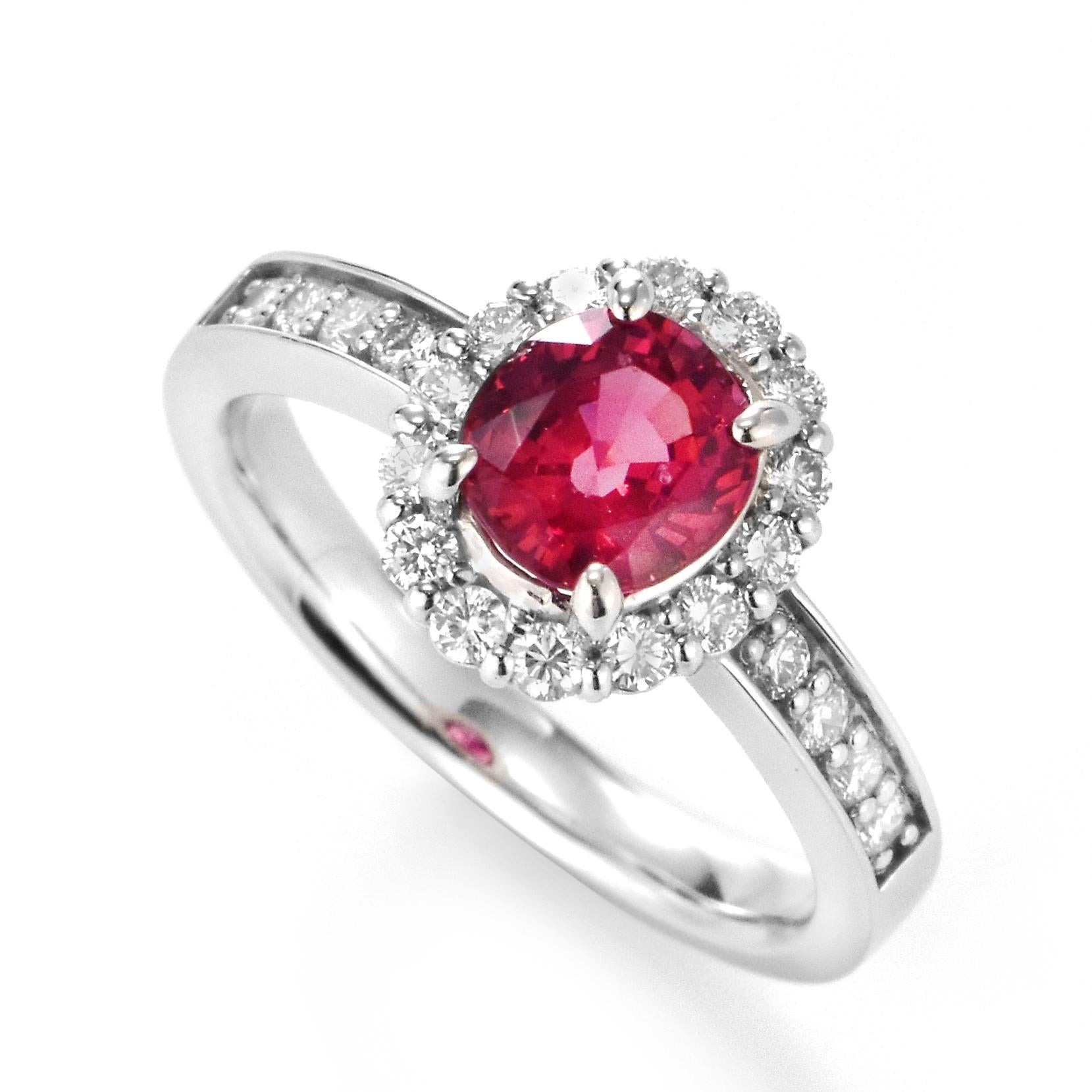 A beautiful halo ring featuring a GIA Certified 1.256 Carat Natural, No Heat, Burmese Spinel and 0.42 Carats of Diamond Accents set in Platinum. Spinel has been frequently confused with ruby, but it’s a gem that can stand on its own merits. Many