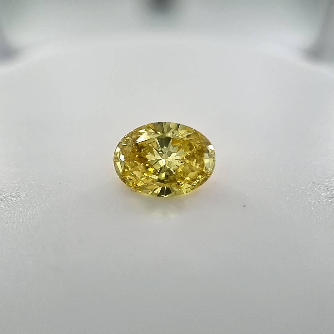 Modern GIA Certified  1.26 Carat Oval Brilliant Vivid Yellow Zimmi Loose Diamond For Sale