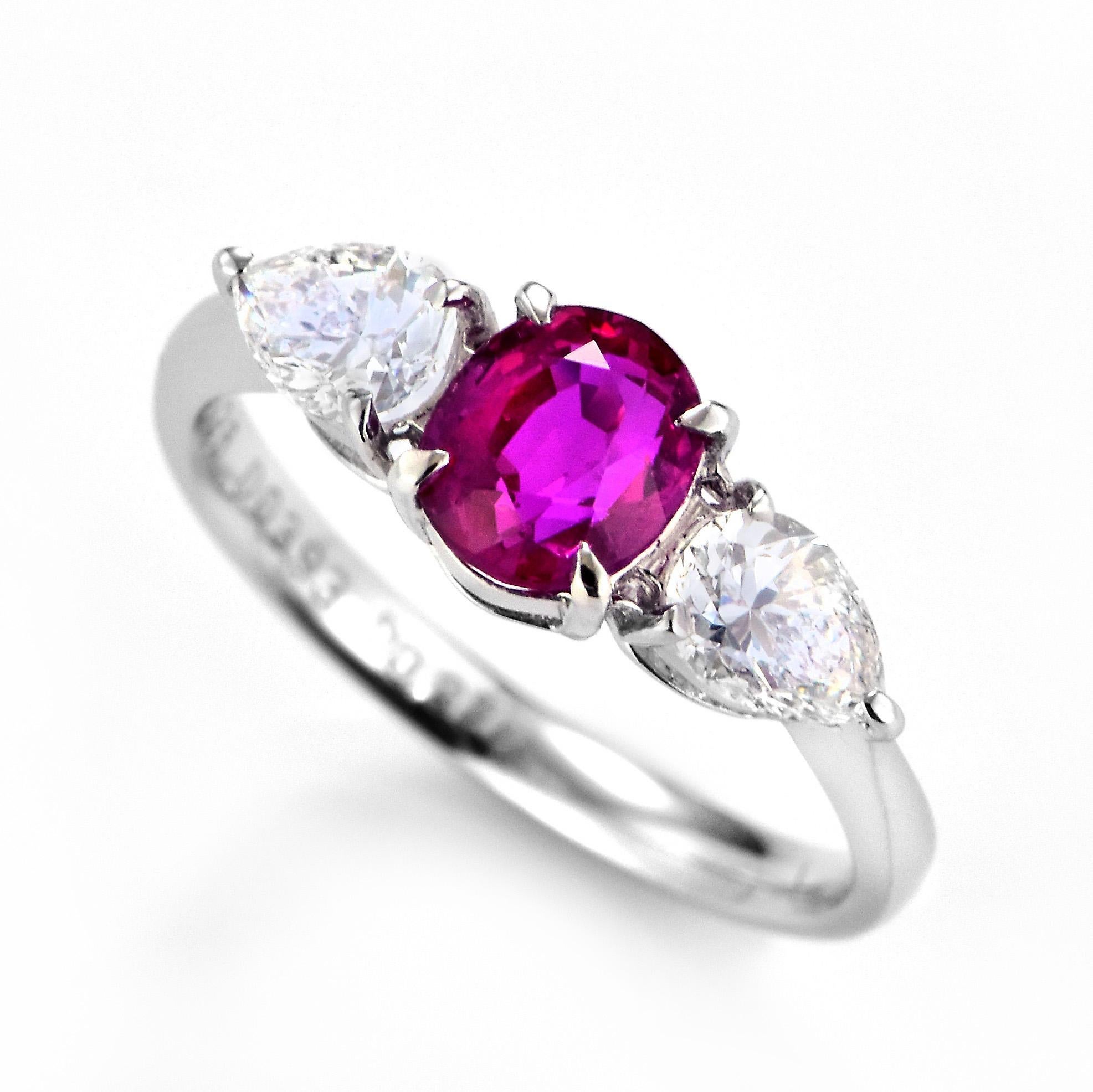 A beautiful Ring set in Platinum featuring a GIA Certified 1.26 Carat Natural Untreated, Burmese Ruby and 0.761 Carat Diamonds. Rubies are referred to as 