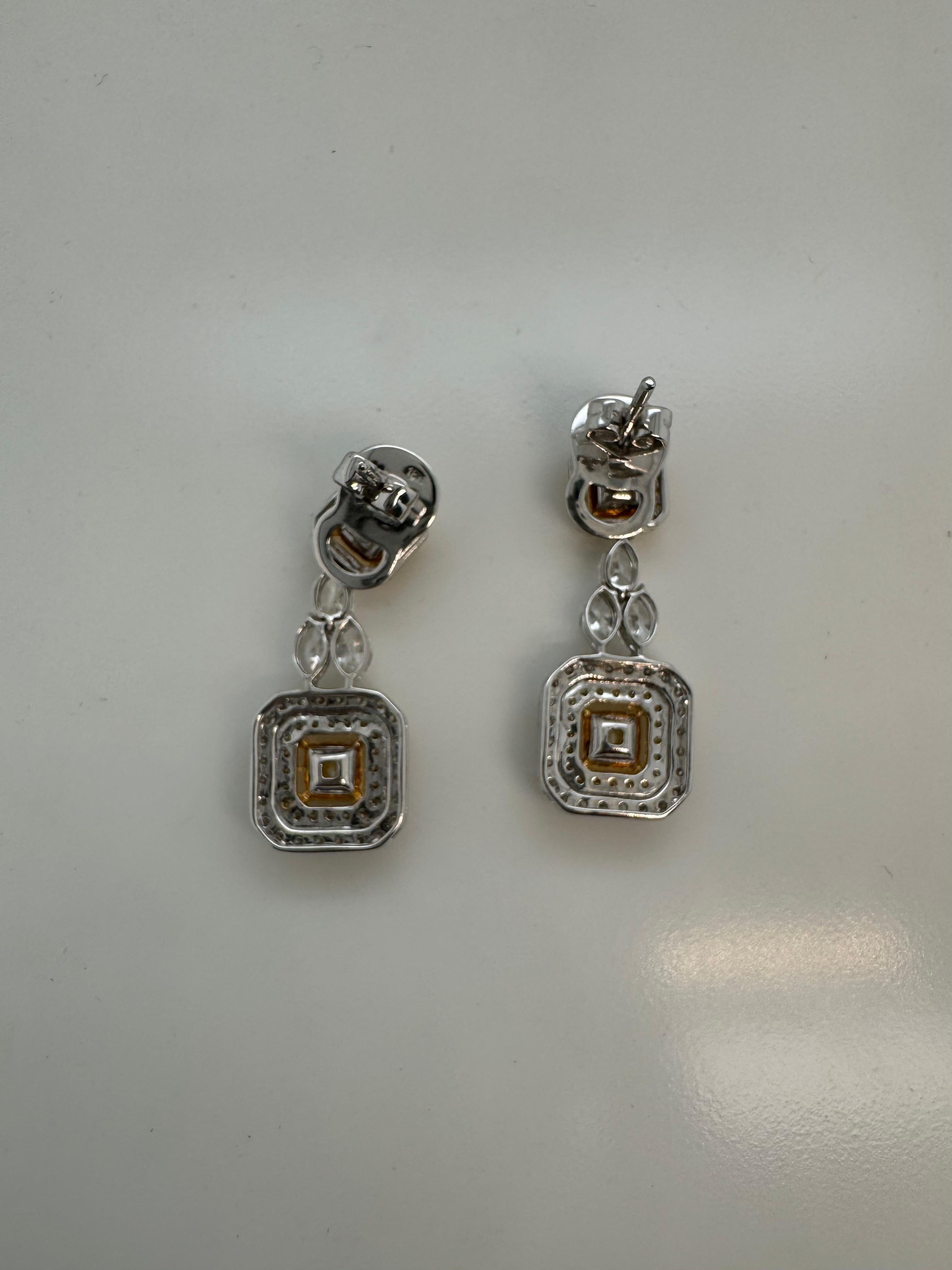 GIA Certified 1.26 Cts. Fancy Intense Yellow Diamond Earrings in 18k White Gold In New Condition For Sale In Bangkok, TH