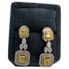 Certifié GIA 1,26 ct. Boucles d'oreilles fantaisie en or blanc 18 carats avec diamant jaune intense