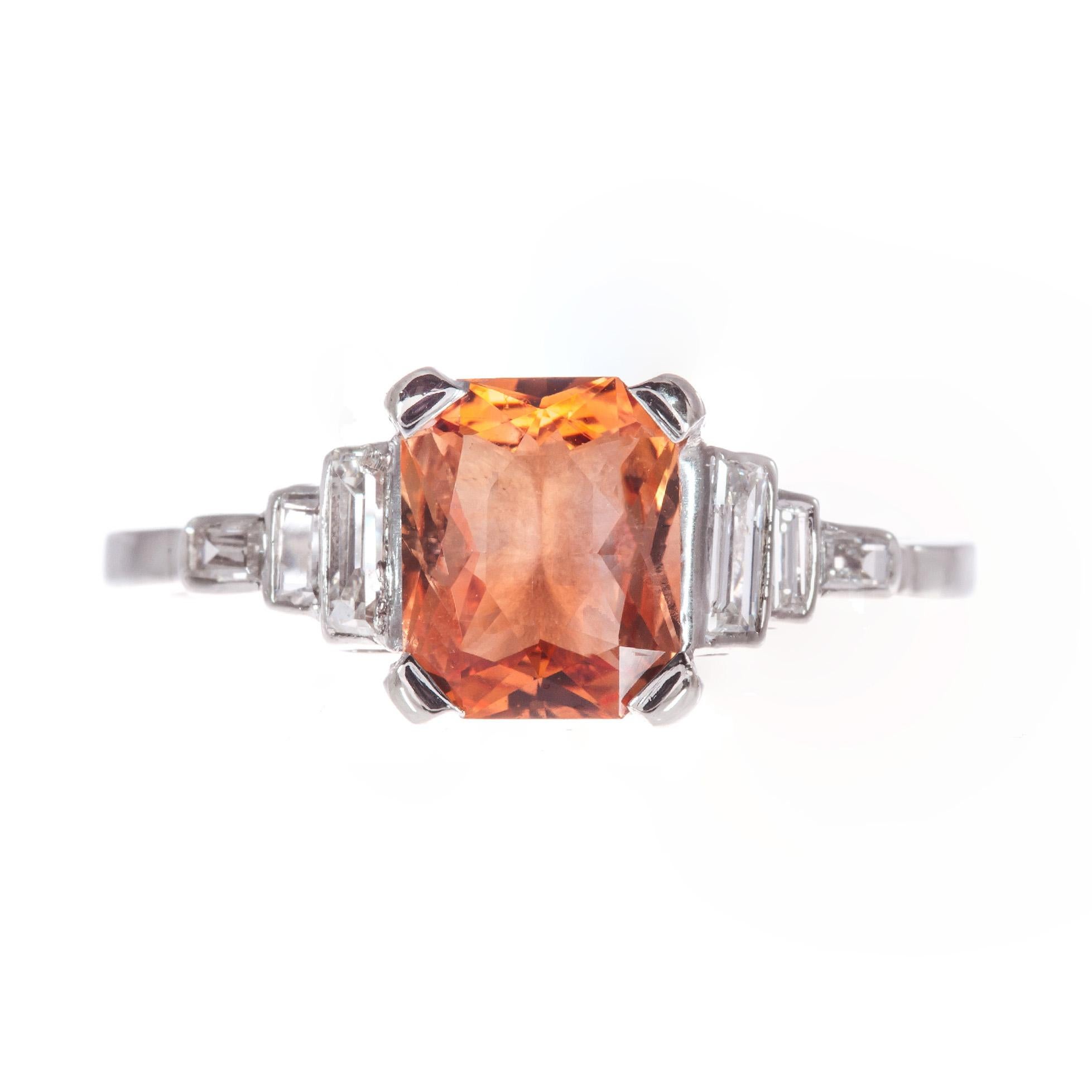 Orange sapphire and diamond engagement ring. GIA certified natural simple heat only sapphire in its original 1930’s Art Deco platinum setting with six baguette accent diamonds. Vintage rectangular modified brilliant cut with raised crown and small