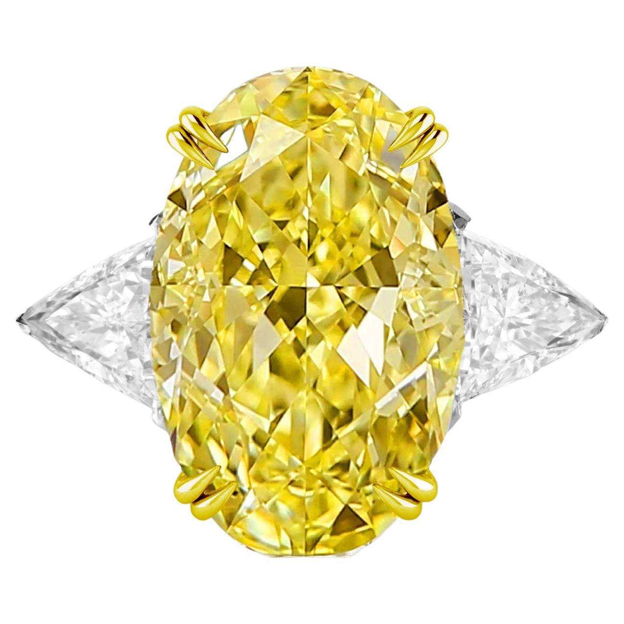 GIA Certified 12.68 Carat  Fancy Intense Yellow Oval Diamond Ring  For Sale