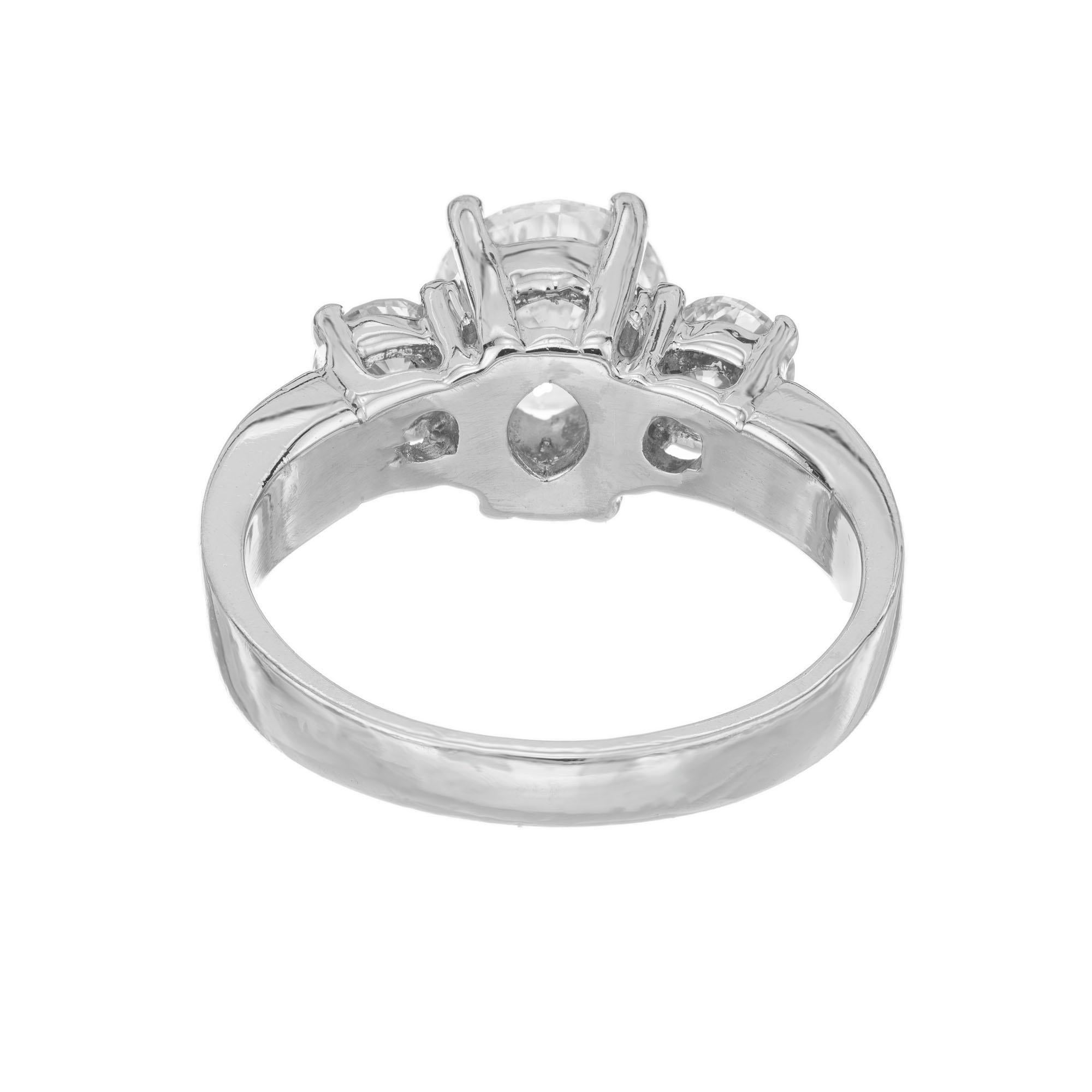 Round Cut GIA Certified 1.28 Carat Diamond Platinum Three Stone Engagement Ring For Sale