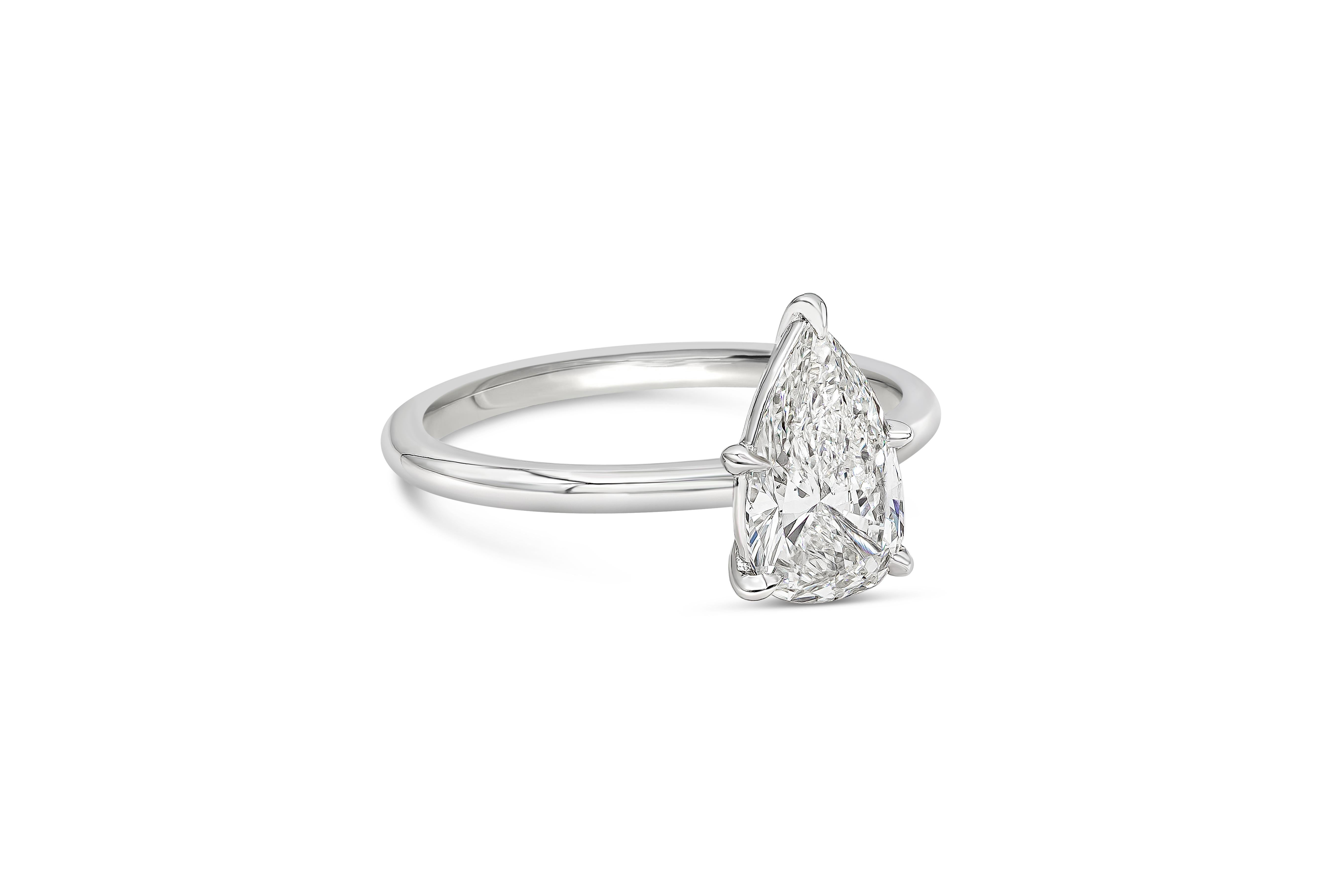 A classic and timeless engagement ring style showcasing a 1.28 carats pear shape diamond certified by GIA as I color and SI1 in clarity, set in a five prong basket setting and thin platinum band. Size 6.5 US resizable upon request.

Roman Malakov is