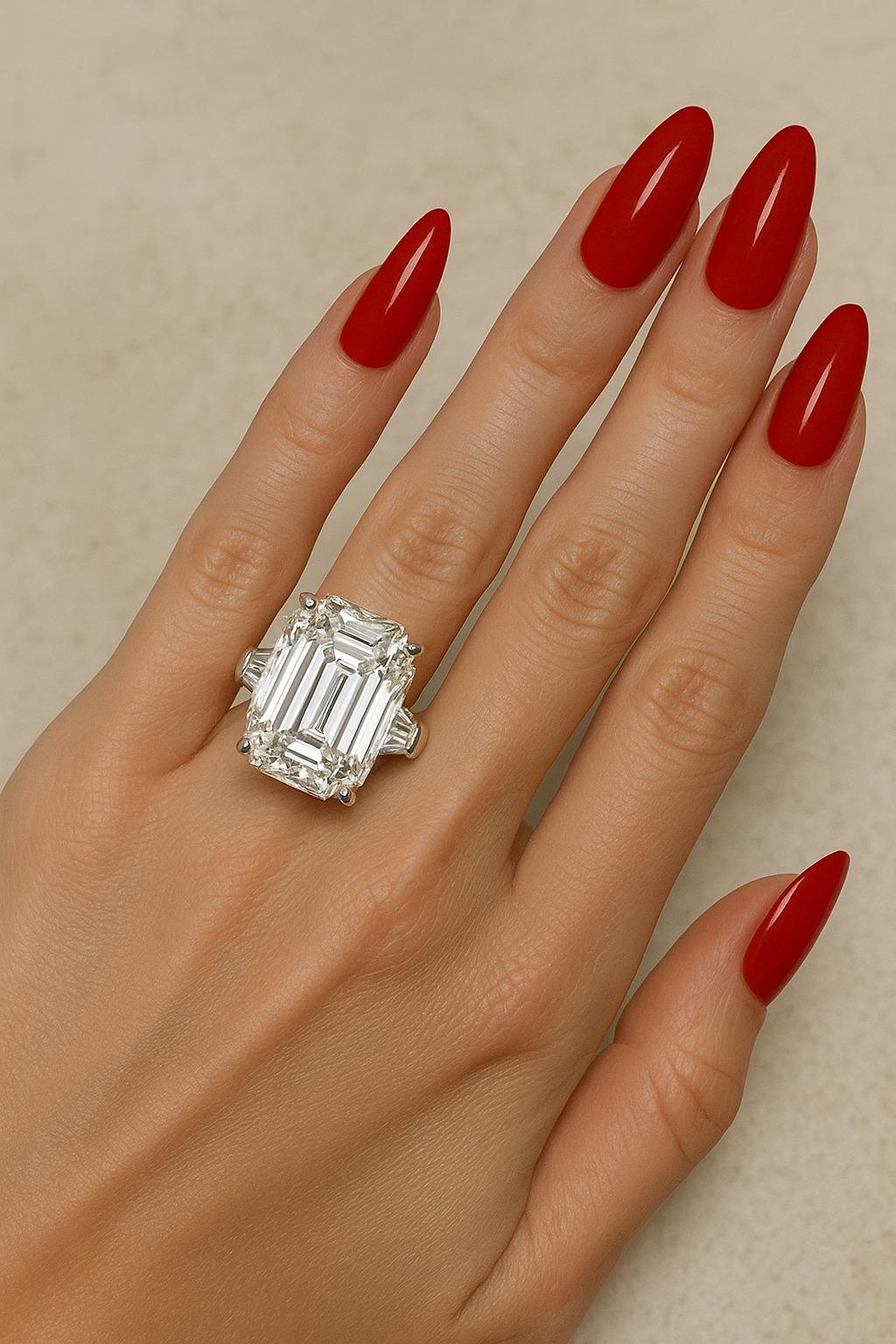 GIA Certified 12.88 Carat Emerald Cut Diamond Ring with Tapered Baguettes in 18K White Gold

A magnificent and rare GIA certified 12.88 carat emerald cut diamond, presented in an elegant custom 18K white gold setting with tapered baguette side