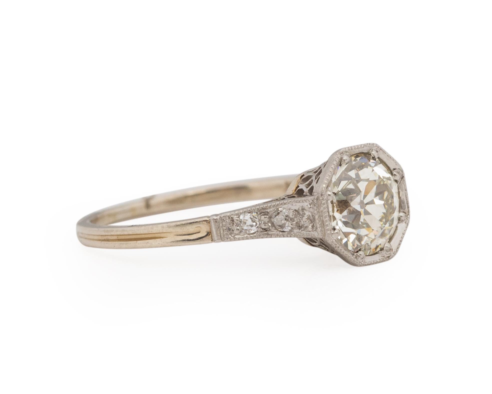 Ring Size: 6.5
Metal Type: Platinum & 14K Yellow Gold [Hallmarked, and Tested]
Weight: 3.0 grams

Center Diamond Details:
GIA REPORT #: 5221045017
Weight: 1.29ct
Cut: Old European brilliant
Color: N
Clarity: VS1
Measurements: 6.79mm x 6.67mm x