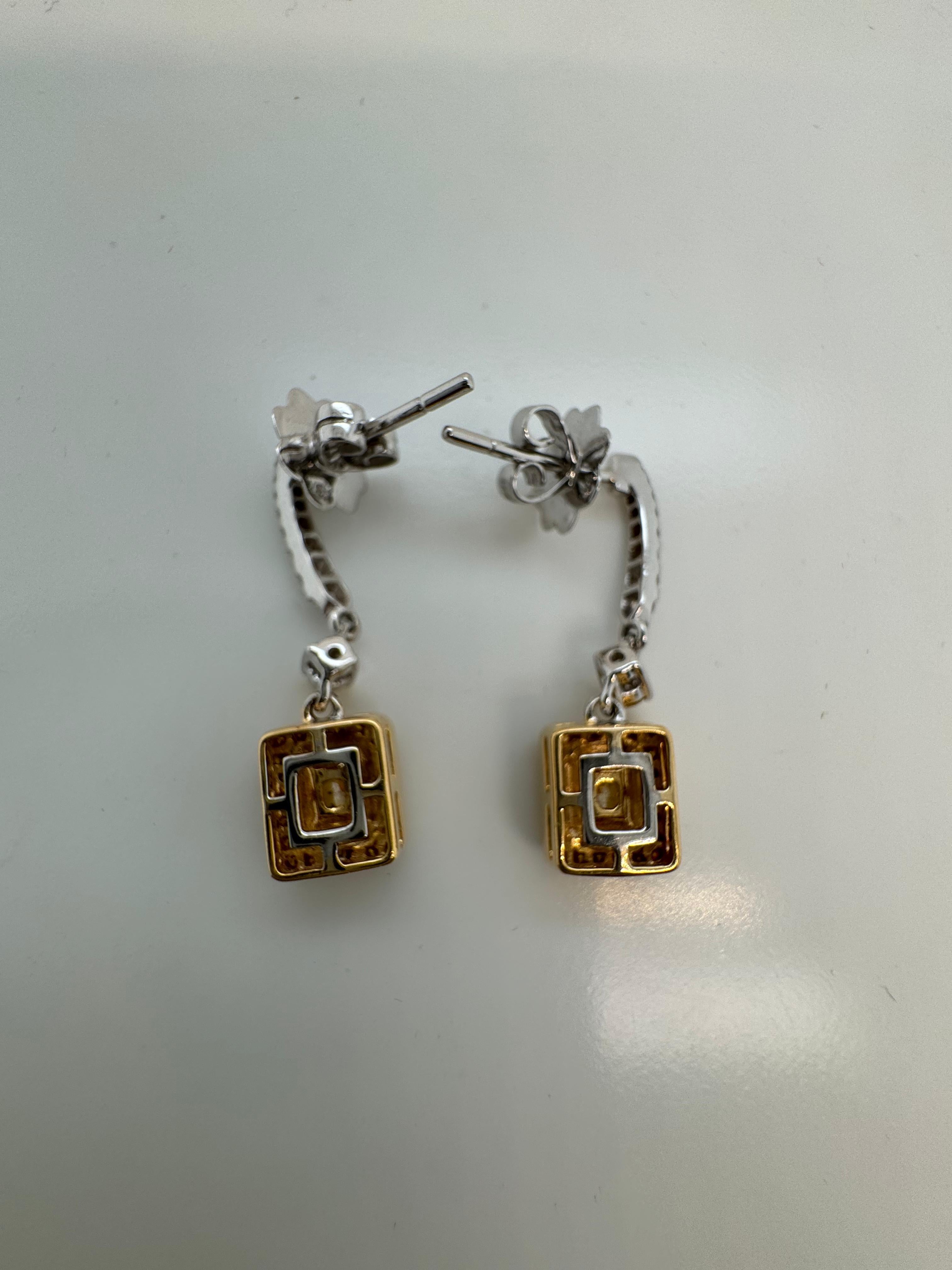 GIA Certified 1.29 Carats Fancy Yellow Diamond Earrings in 18k White Gold In New Condition For Sale In Bangkok, TH