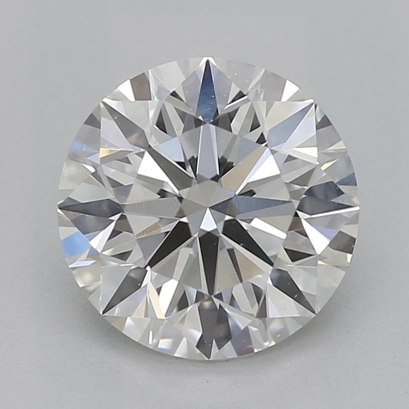 Fabriquée à la main à New York, cette bague en diamant est d'une élégance stupéfiante. Son centre est constitué d'un diamant rond certifié par le GIA pesant 1,2 kg et classé I et VS2. Serti dans un luxueux or blanc, l'éclat du diamant est