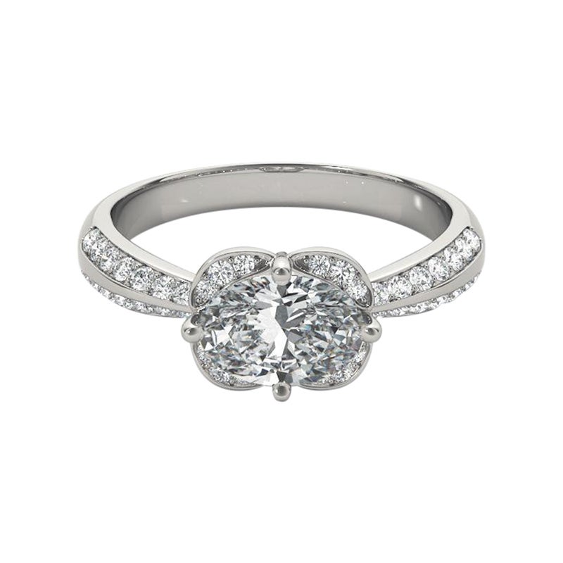 Bague à diamants certifiée GIA de 1.3 carat avec halo ovale est-ouest et double pavage