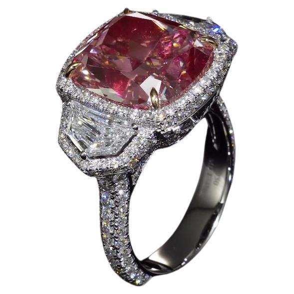 Découvrez l'incarnation de la rareté et de la sophistication avec notre bague en diamant rose, une création envoûtante qui transcende l'ordinaire.

Caractéristiques principales :

Pièce maîtresse : Un magnifique diamant certifié GIA de couleur