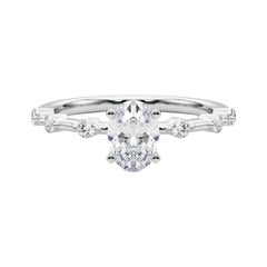 Anello di diamanti con gambo di bambù e diamante ovale da 1.3 carati certificato GIA