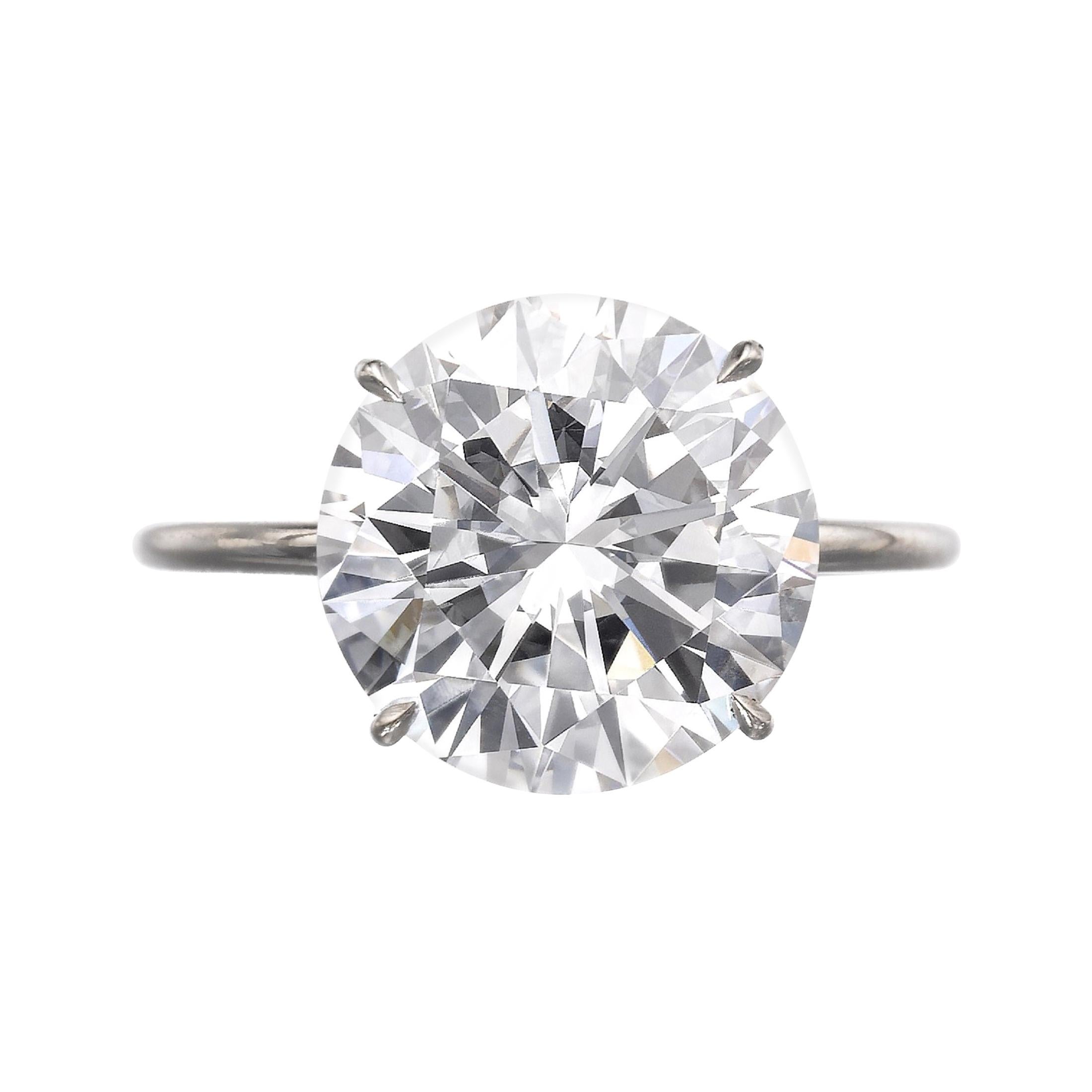 GIA Certified 13 Carat Round Brilliant Cut Diamond Platinum Ring 
Triple Excellent Cut 
K Color 
VVS2 Clarity