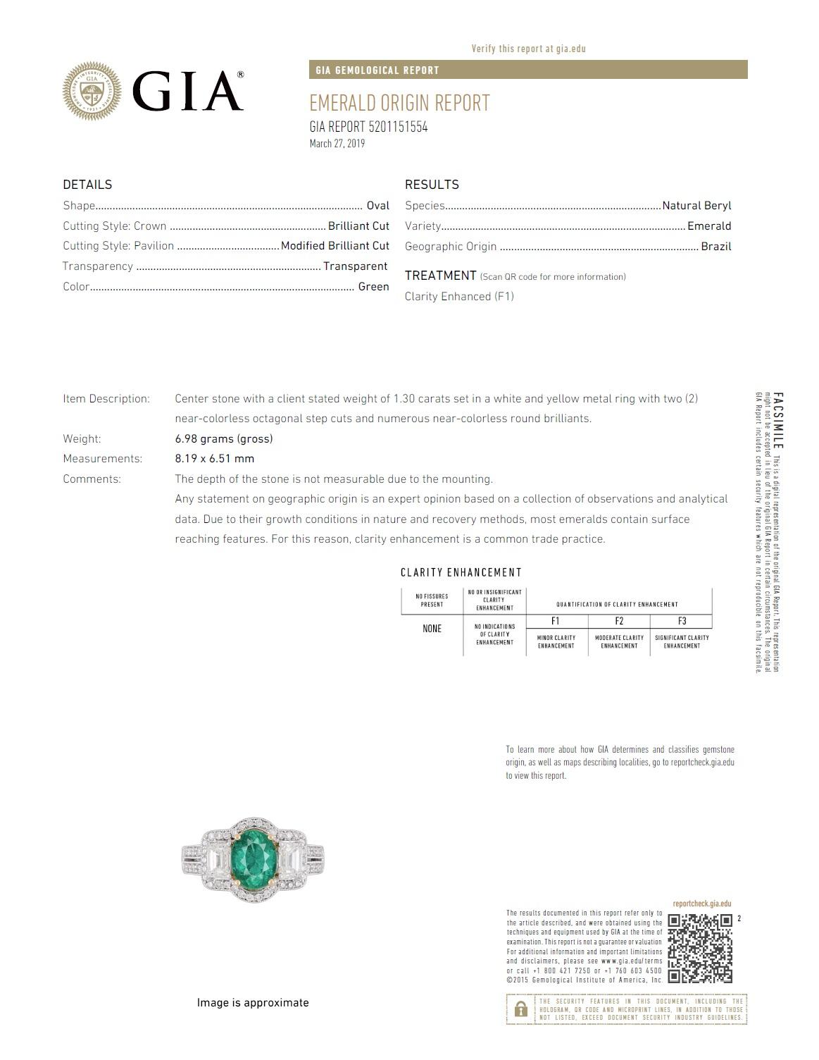 This stunning ring has a GIA Certified 1.30 carat oval cut emerald center, flanked by two emerald cut diamonds (0.84 carats), and perfectly enhanced by another 0.36 carats of round diamonds. (Total diamond weight 1.20 carats.)

GIA Certification