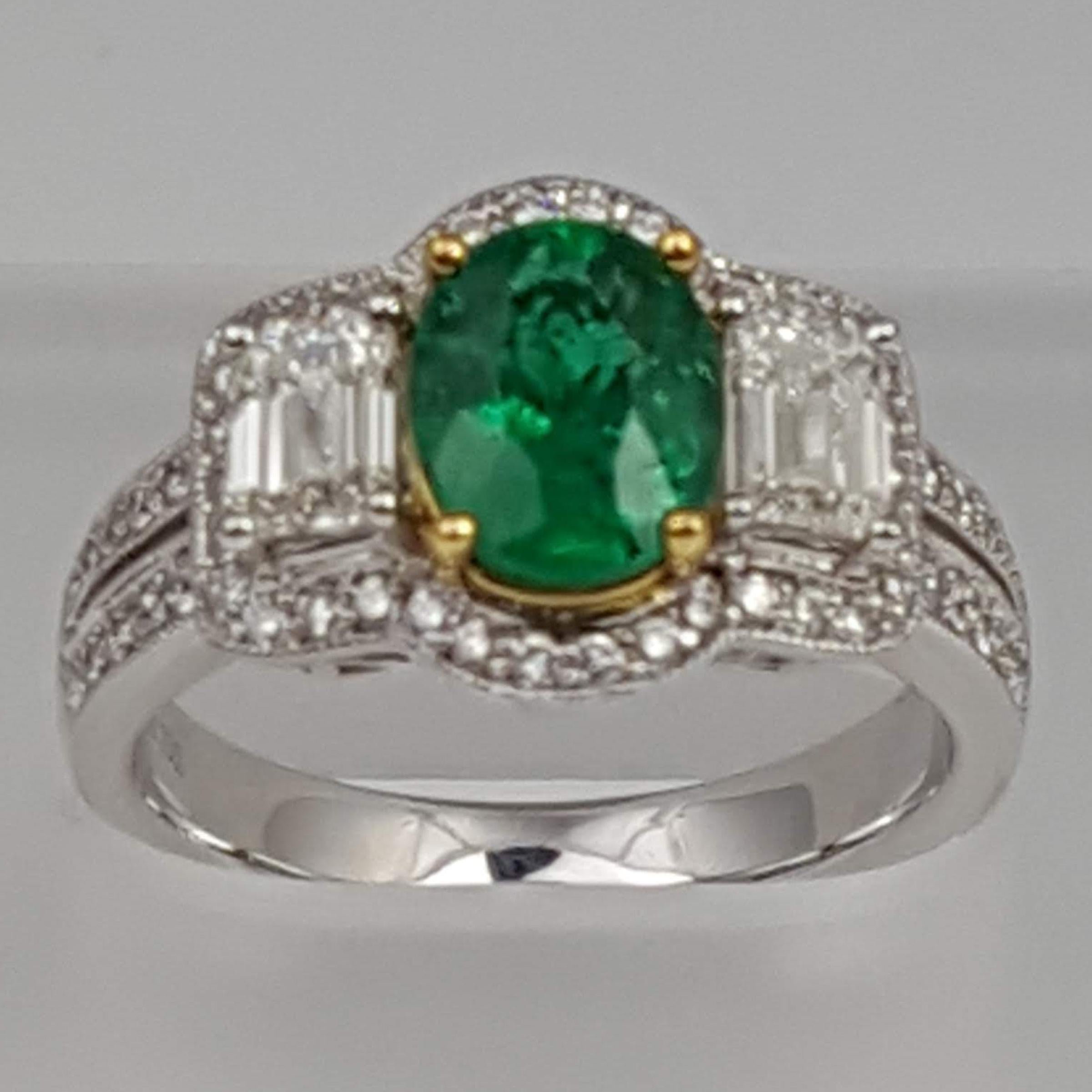 Contemporary GIA Certified 1.30 Carat Oval Cut Emerald and Diamond Ring in 18 Karat Gold