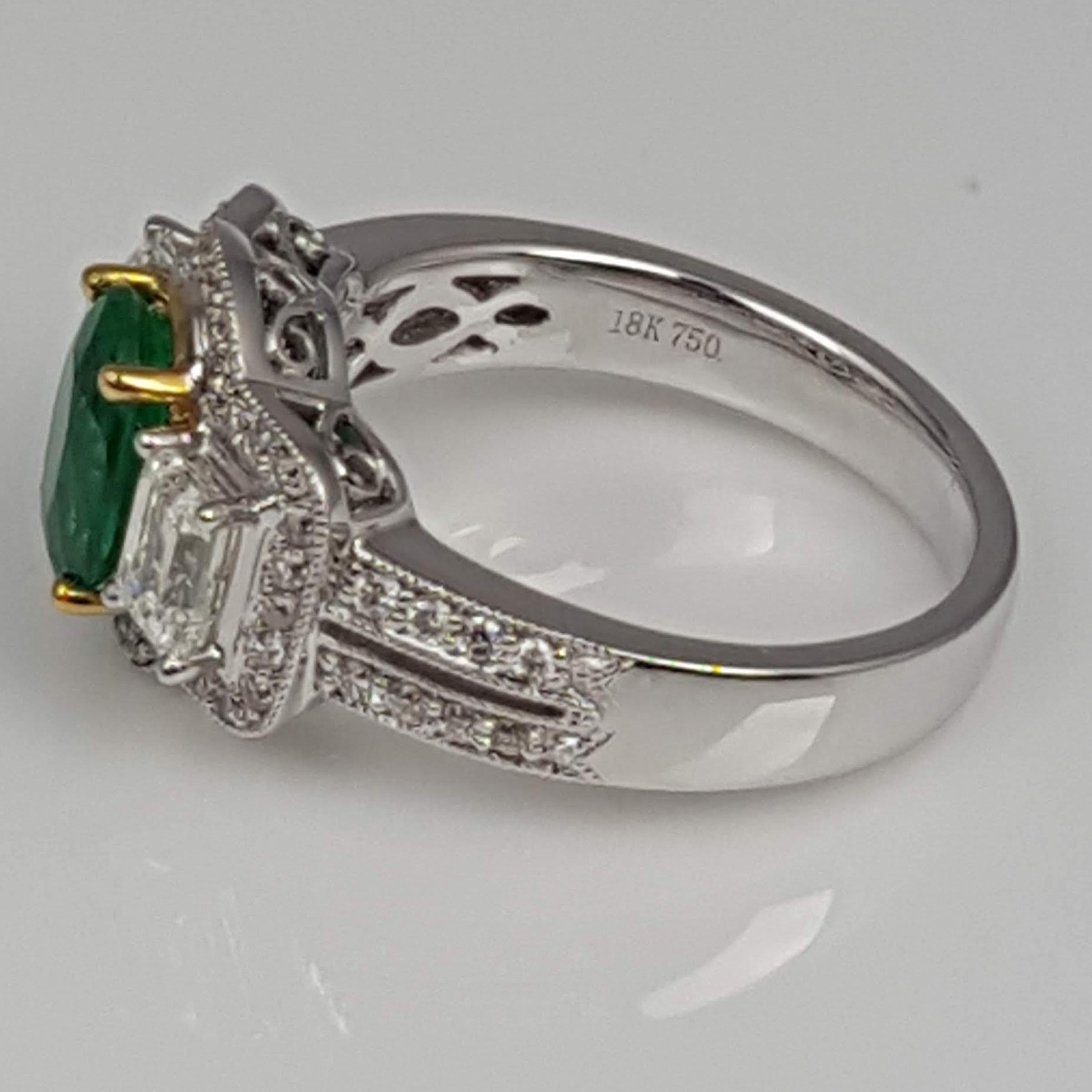 Women's GIA Certified 1.30 Carat Oval Cut Emerald and Diamond Ring in 18 Karat Gold
