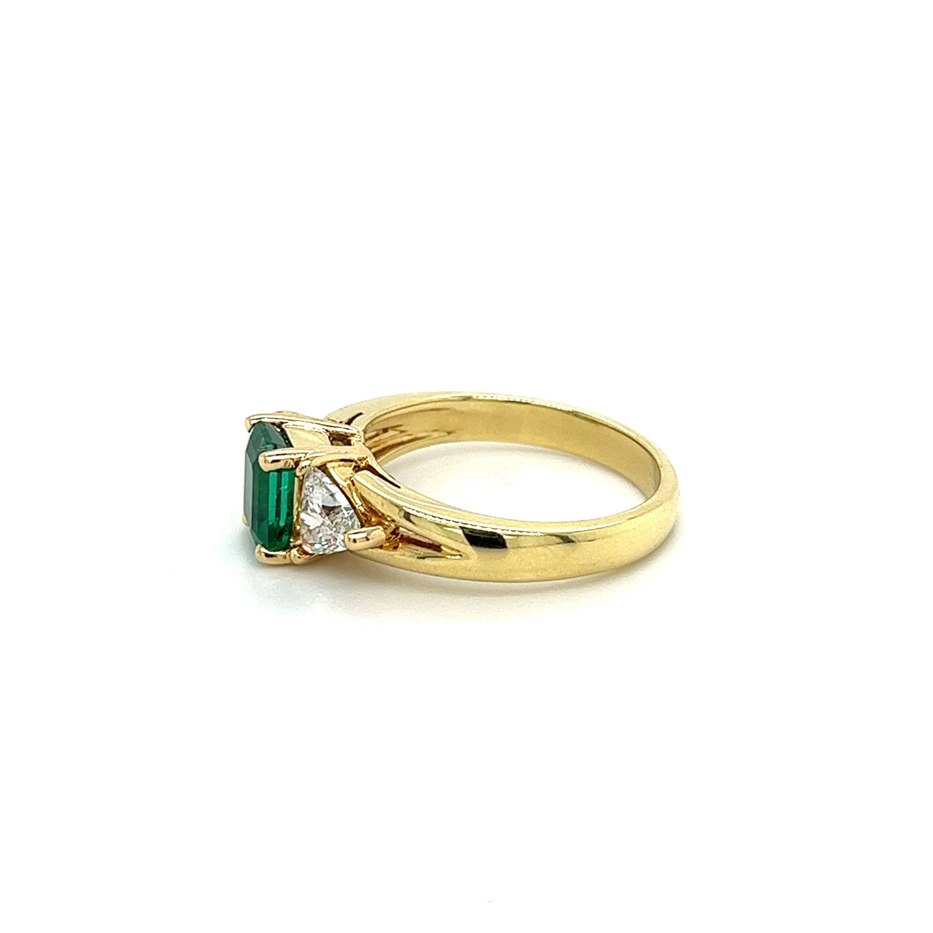 Modern GIA Certified 1.30 Ct Minor Oil Emerald & Trillion Diamond 3-Stone Ring in 18K For Sale