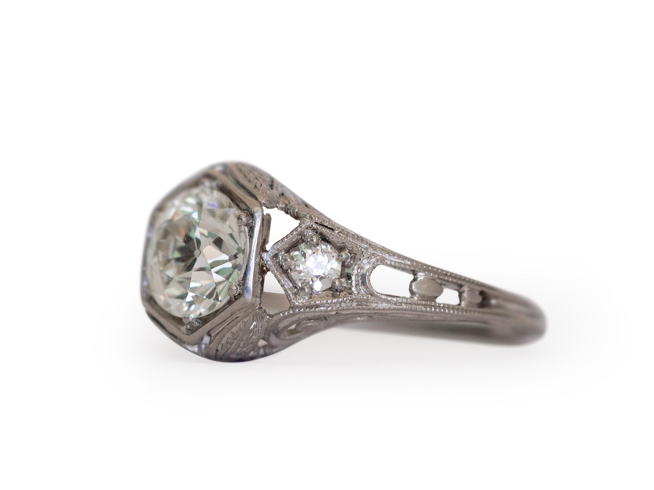 Ring Size: 6.5
Metal Type: Platinum  [Hallmarked, and Tested]
Weight:  3.5 grams

Center Diamond Details:
GIA REPORT #: 2211152880
Weight: 1.31 carat
Cut: Old European Brilliant
Color: M
Clarity: VVS1

Side Diamond Details:
Weight: .15 carat, total