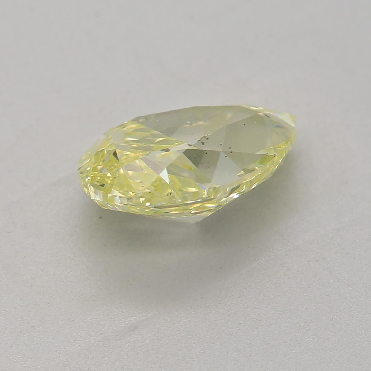 Pear Cut GIA Certified 1.31 Carat Fancy Greenish Yellow SI1 Clarity Diamond For Sale