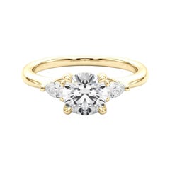 Bague à trois pierres en or jaune 18 carats certifiée GIA de 1,31 carat de diamants ronds et de poires
