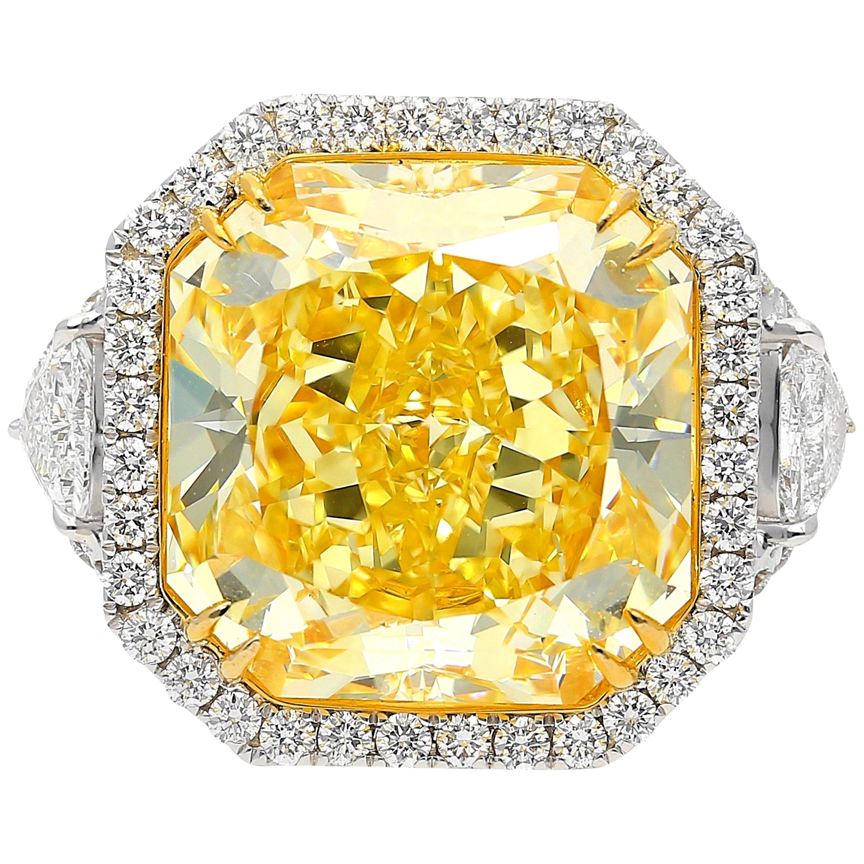 GIA Certified 13.14 Carat Fancy Intense Yellow "VVS1" Clarity Diamond Ring For Sale
