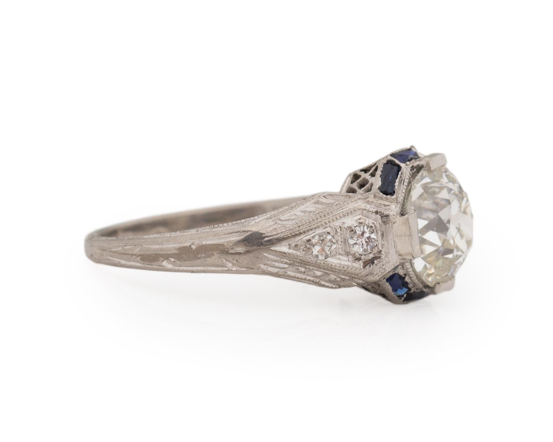 Ring Size: 4.5
Metal Type: Platinum [Hallmarked, and Tested]
Weight: 2.8 grams

Center Diamond Details:
GIA REPORT #: 5222174077
Weight: 1.33ct
Cut: Old European brilliant
Color: J
Clarity: VS2
Measurements: 6.90mm x 6.80mm x 4.47mm

Side Stone