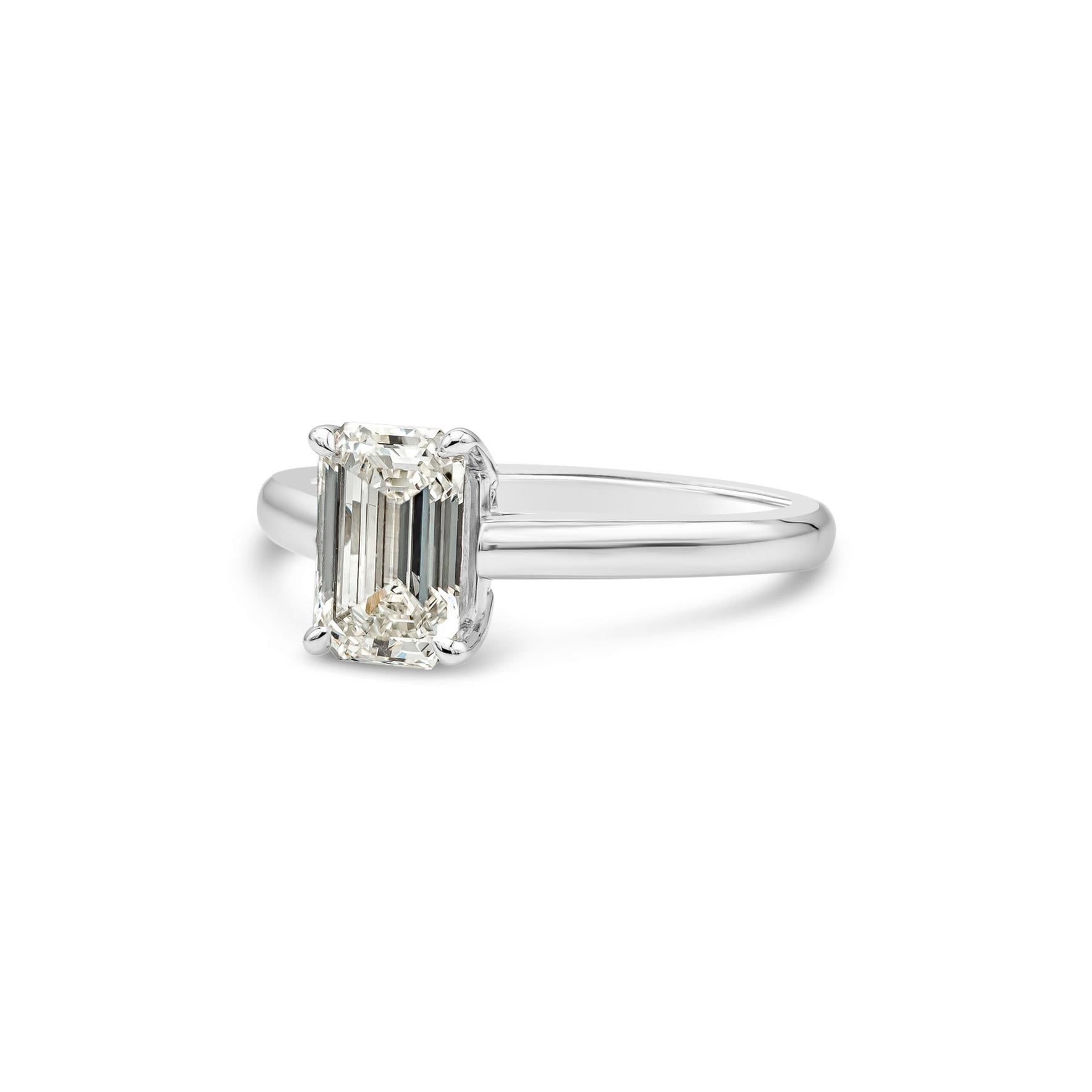 A simple style engagement ring that exudes a lot of elegance. Showcasing a 1.33 carat emerald cut diamond certified by GIA as L color, VS2 clarity, set in a thin solitaire style mounting made in platinum. Size 6.25 US (sizable upon request).

Style