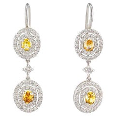 GIA Certified 1.33 Carat Total Oval Fancy Yellow Diamond Dangle Earrings