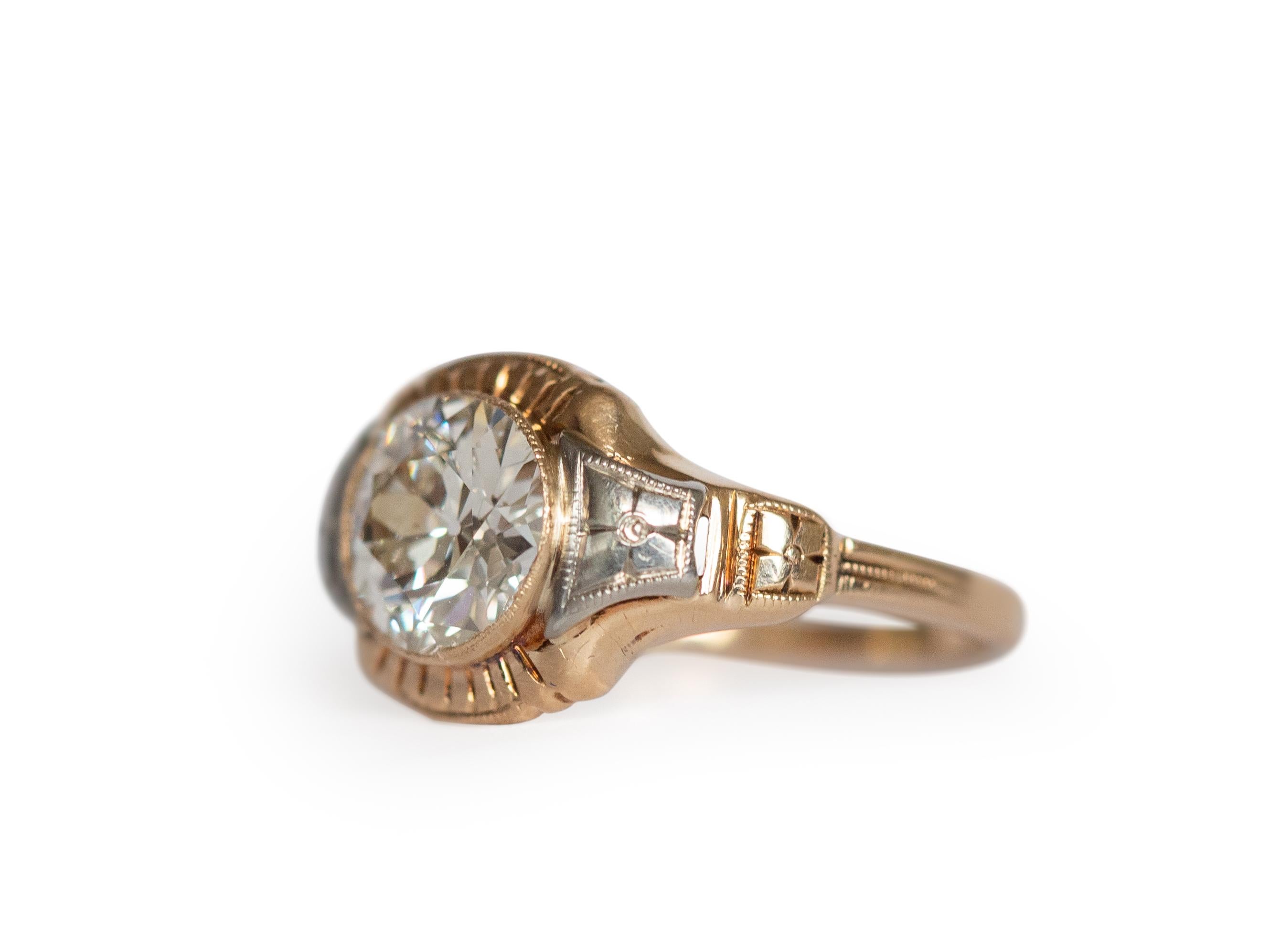 Ring Size: 5.25
Metal Type: 14k Yellow Gold & Plat  [Hallmarked, and Tested]
Weight:  2.55 grams

Center Diamond Details:
GIA REPORT#: 1216086207
Weight: 1.34 carat
Cut: Old European Brilliant
Color: K
Clarity: VS2

Finger to Top of Stone