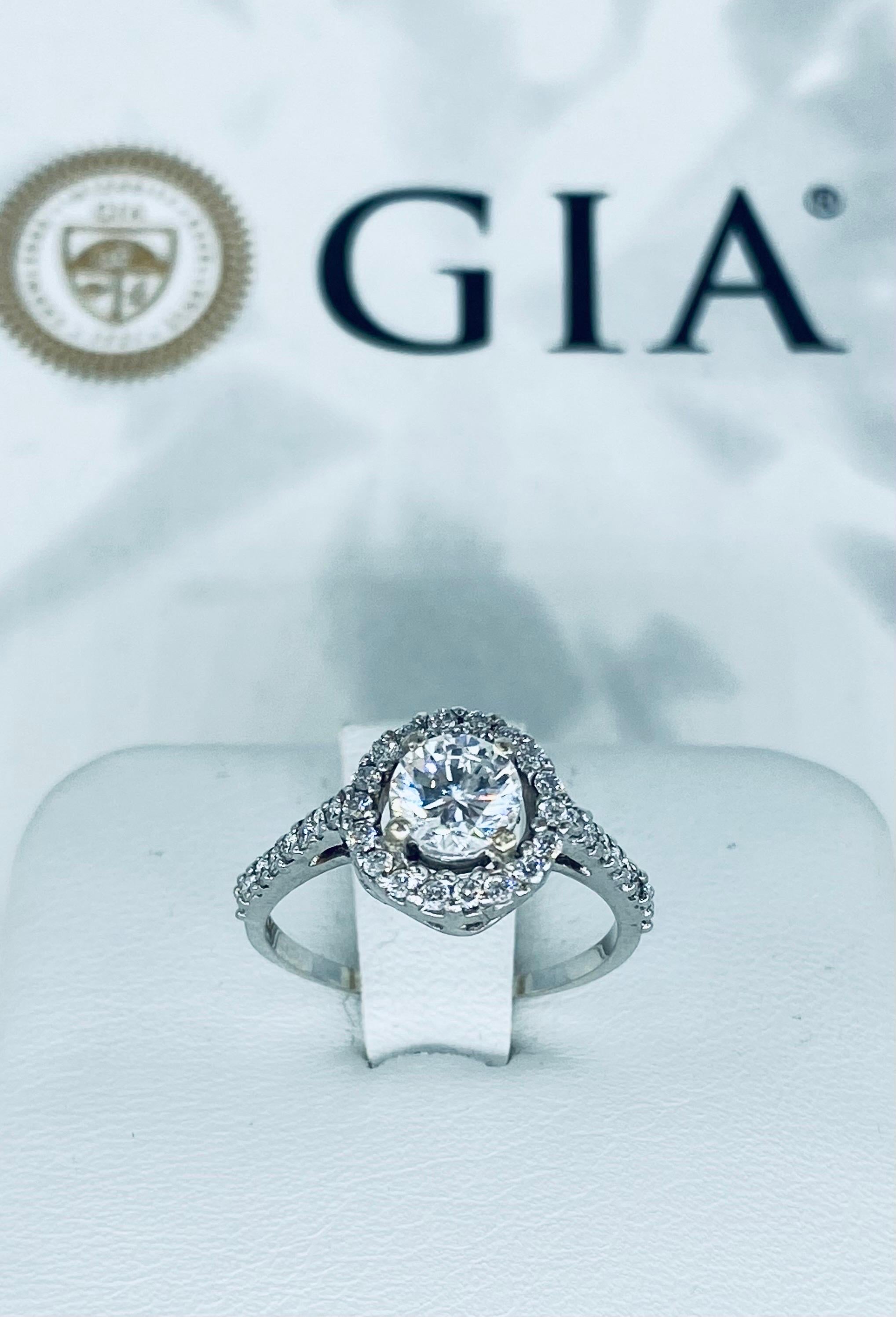 GIA Certified 1.34 Carat Diamonds Halo Engagement Ring 18k White Gold For Sale 1