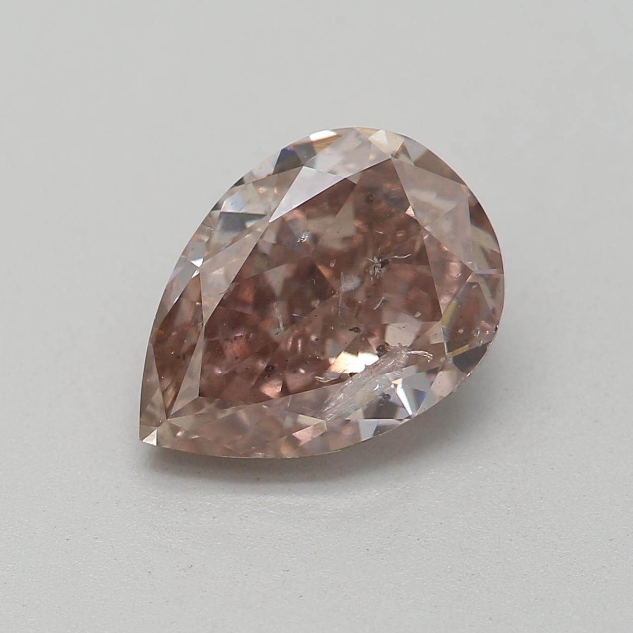 Certificate: GIA 
Report Number: 6202349472
Shape And Cut: Pear
Carat Weight: 1.34 carat
Measurements: 8.33 x 6.01 x 3.74 mm
Color Grade: Fancy Pinkish Brown

FEATURES OF THE DIAMOND:

This pinkish brown diamond is a rare and stunning diamond that