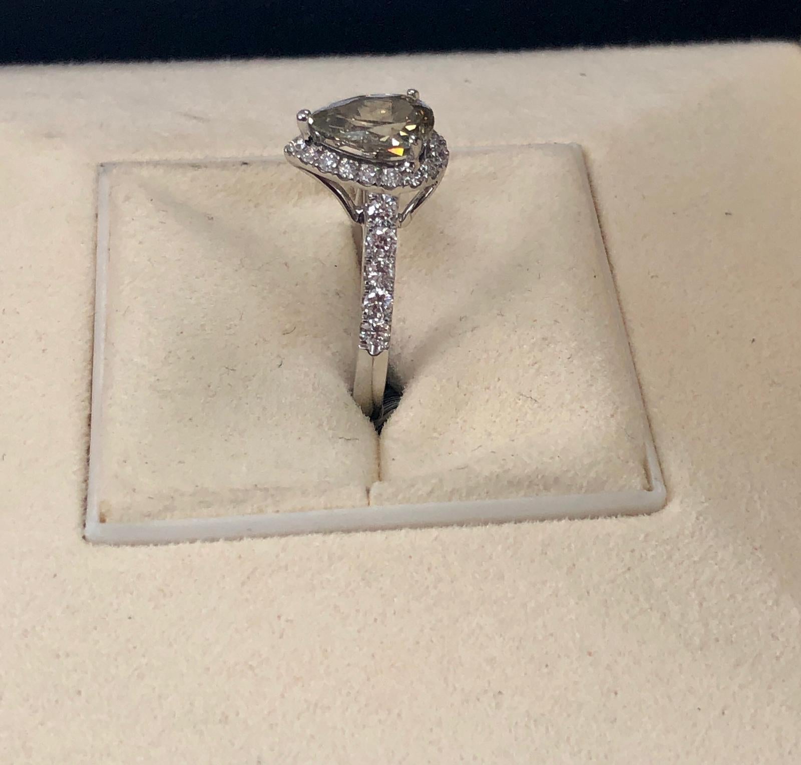 GIA Certified 1.35 Carat Natural Fancy Yellow Pear Diamond Ring 18 Karat Gold In New Condition In Great Neck, NY