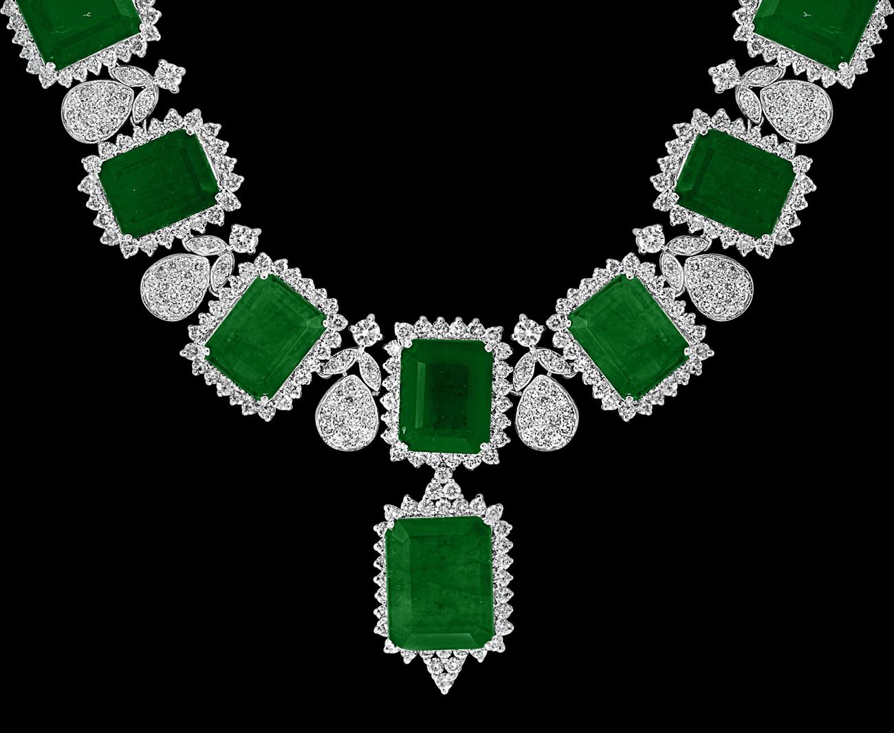 GIA Certified 135 Ct  Emerald Cut  Emerald and 28.50  Ct Diamond Necklace and Earring  Bridal  Suite.
Emeralds are Brazilian and Natural 
Two Random stones were certified 
The first stone is the drop of the necklace in the middle 
Natural Beryl
GIA