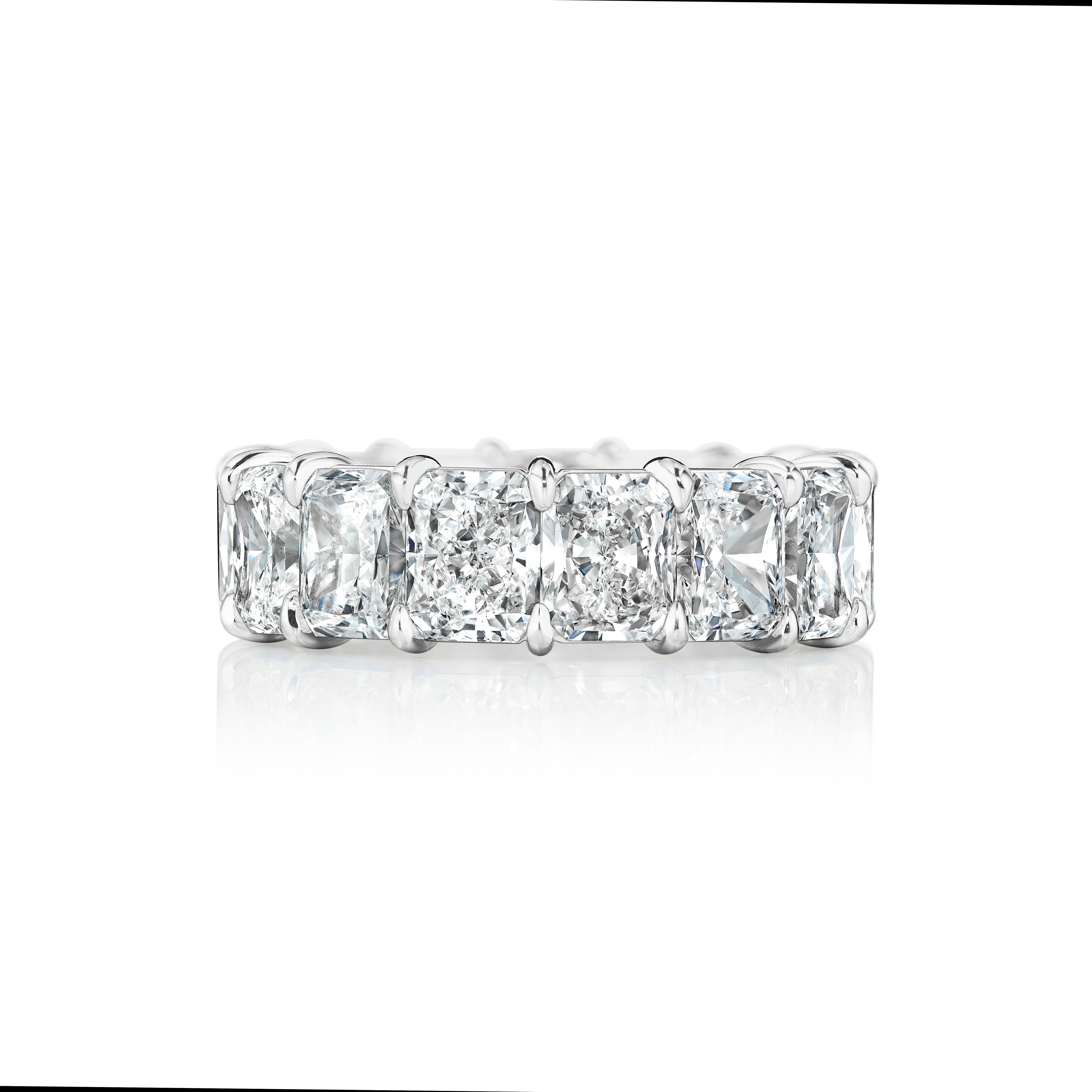 The Ultimate Emerald Cut Eternity Band.
14 Perfectly Matched Emerald Cuts each weighing over 0.90 Carat for 12.90 Carats in Total.
D-F Color and VS2-SI2 Clarity.
Set in a Platinum Handmade Classic Setting.
Set with elongated stones.
Size 6
