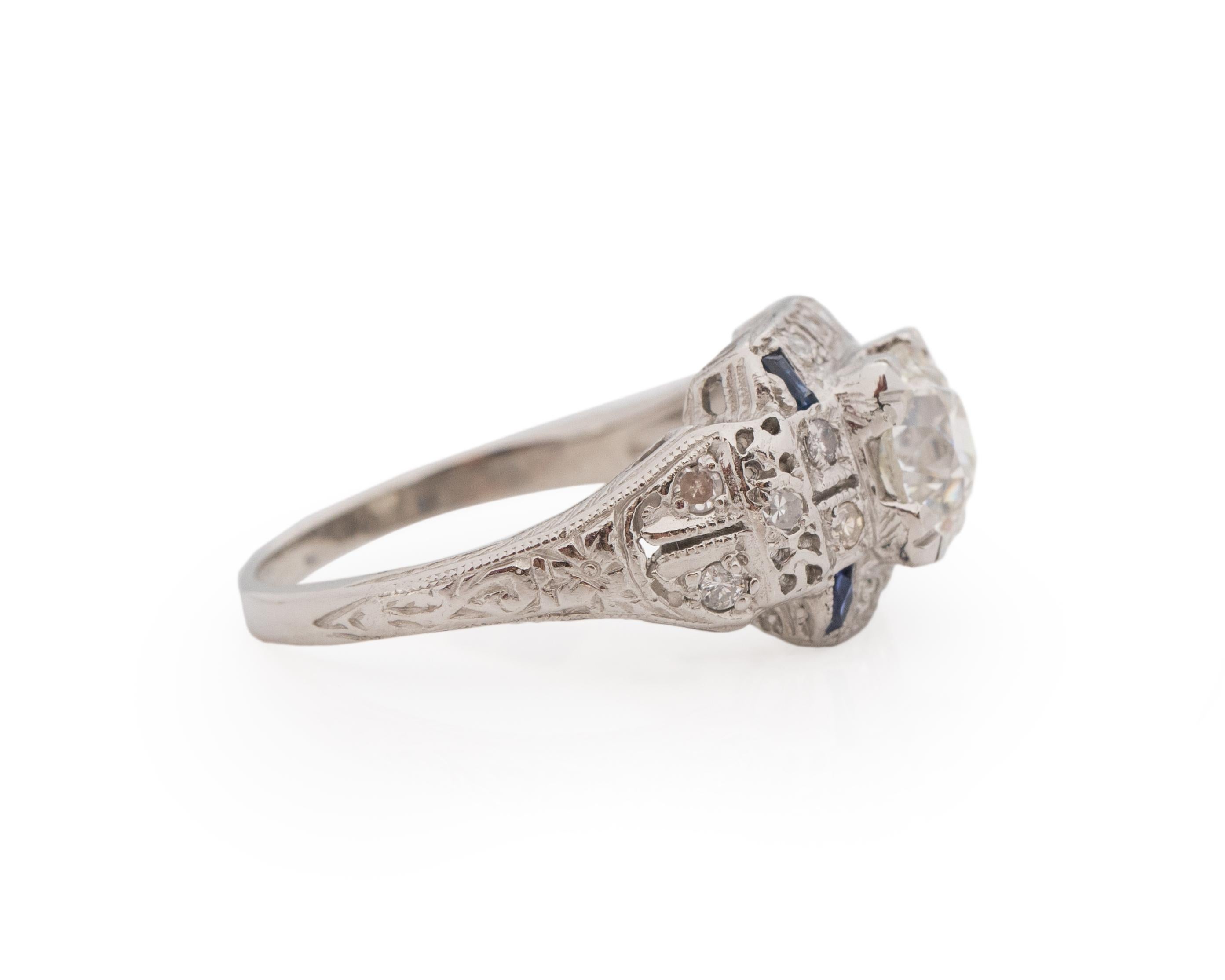 Ring Size: 6.5
Metal Type: Platinum [Hallmarked, and Tested]
Weight: 3.5 grams

Center Diamond Details:
Weight: 1.36ct
Cut: Old European brilliant
Color: I
Clarity: I1 (Eye Clean)

Side Stone Details:
Weight: .20ct, total weight
Cut: Antique