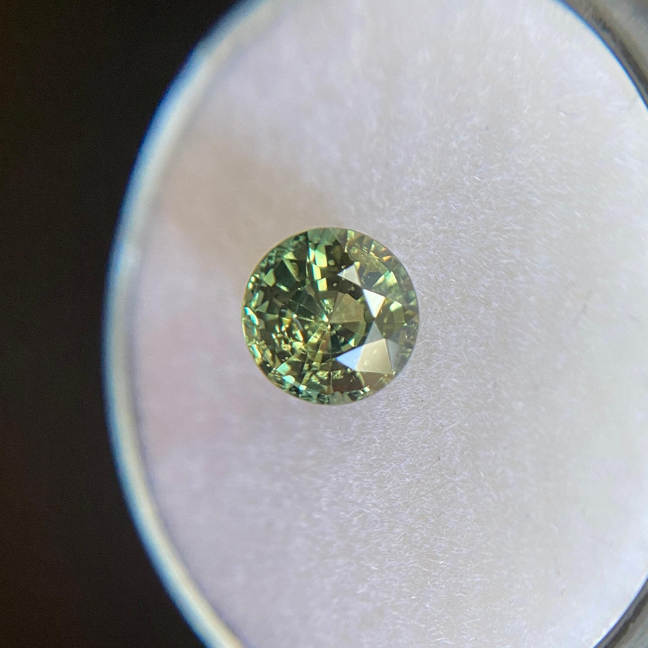 GIA Certified Untreated Green Yellow Sapphire Gemstone.

1.36 Carat unheated sapphire with a beautiful vivid green yellow colour.

Fully certified by GIA confirming stone as natural and untreated.

Also has very good clarity, a clean stone with only