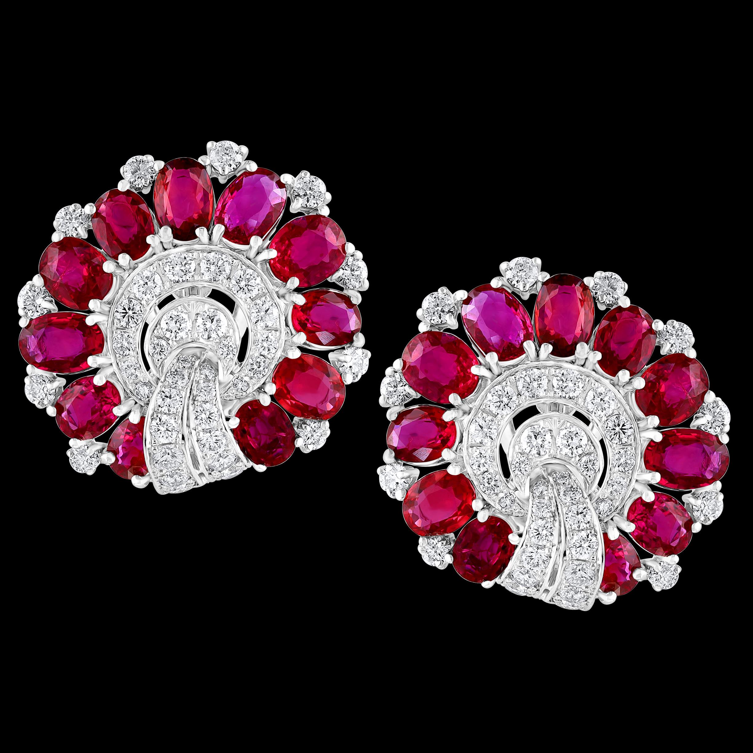 GIA Certified 13.78 Ct Natural Mozambique Ruby No Heat Diamond Earring in Platinum
GIA report # for origin is 2221519625
Natural Corundum
Natural Ruby 
origin Mazambique
 There are 22 Oval Rubies in the earring  ranging from 0.45 ct to 0.79 ct and