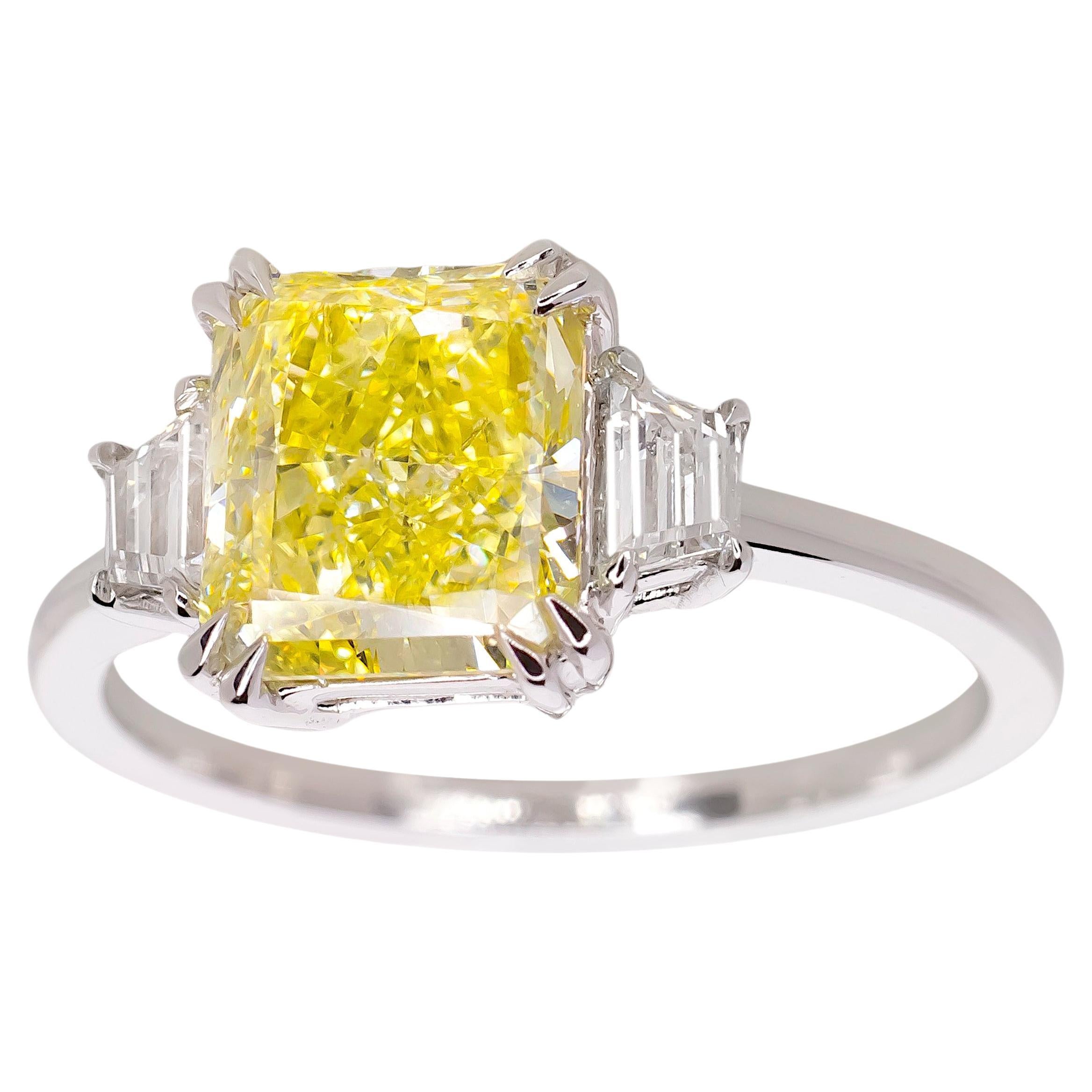 GIA Certified 1.38 Carat Fancy Yellow Radiant Cut Diamond 18K White Gold Ring For Sale