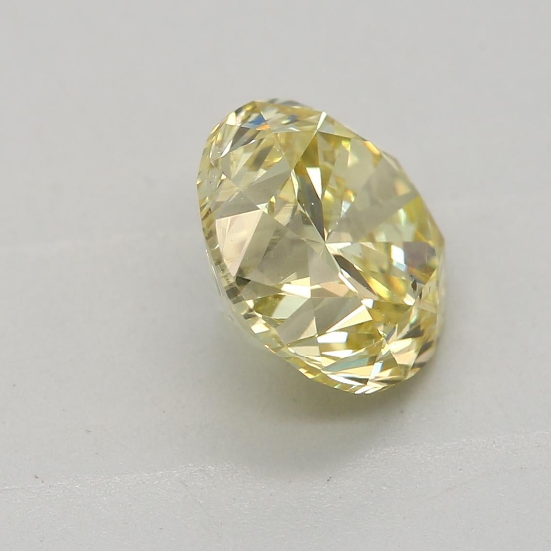 Women's or Men's GIA Certified 1.38 Carat Fancy Yellow SI2 Clarity Diamond For Sale