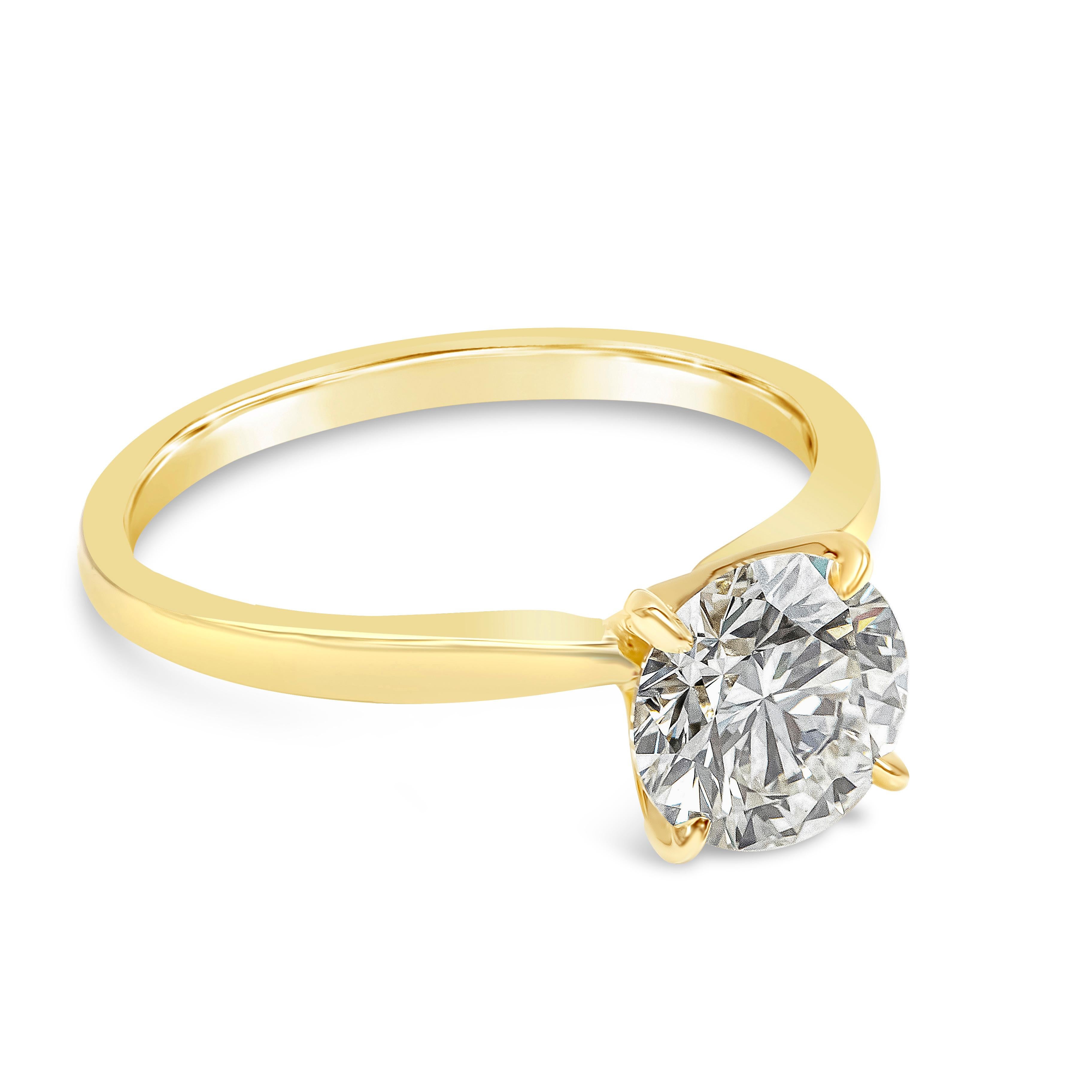 A classic and timeless solitaire engagement ring style showcasing a GIA Certified 1.38 carat total round brilliant diamond, J Color and VS1 in Clarity. In a traditional solitaire 4-prong setting. Made with 18K Yellow Gold. Size 6 US

Style available