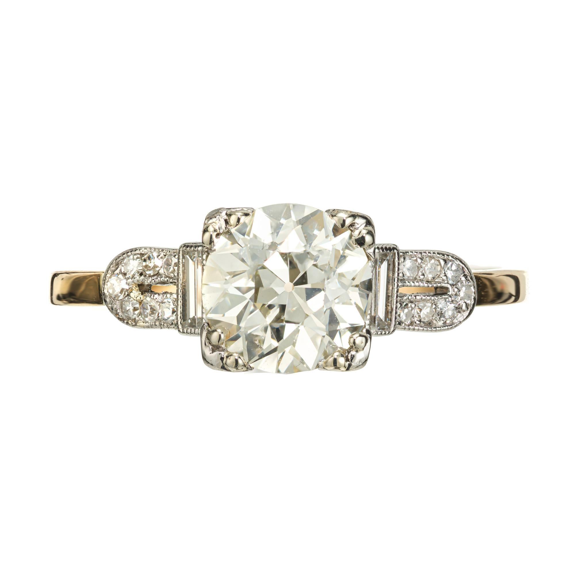 Original 1920's Art Deco old European cut 1.39 carat diamond engagement ring. GIA certified Old European cut diamond center stone in a platinum handmade crown and 14k yellow gold shank with 2 side baguette diamonds and 14 single cut round diamonds.