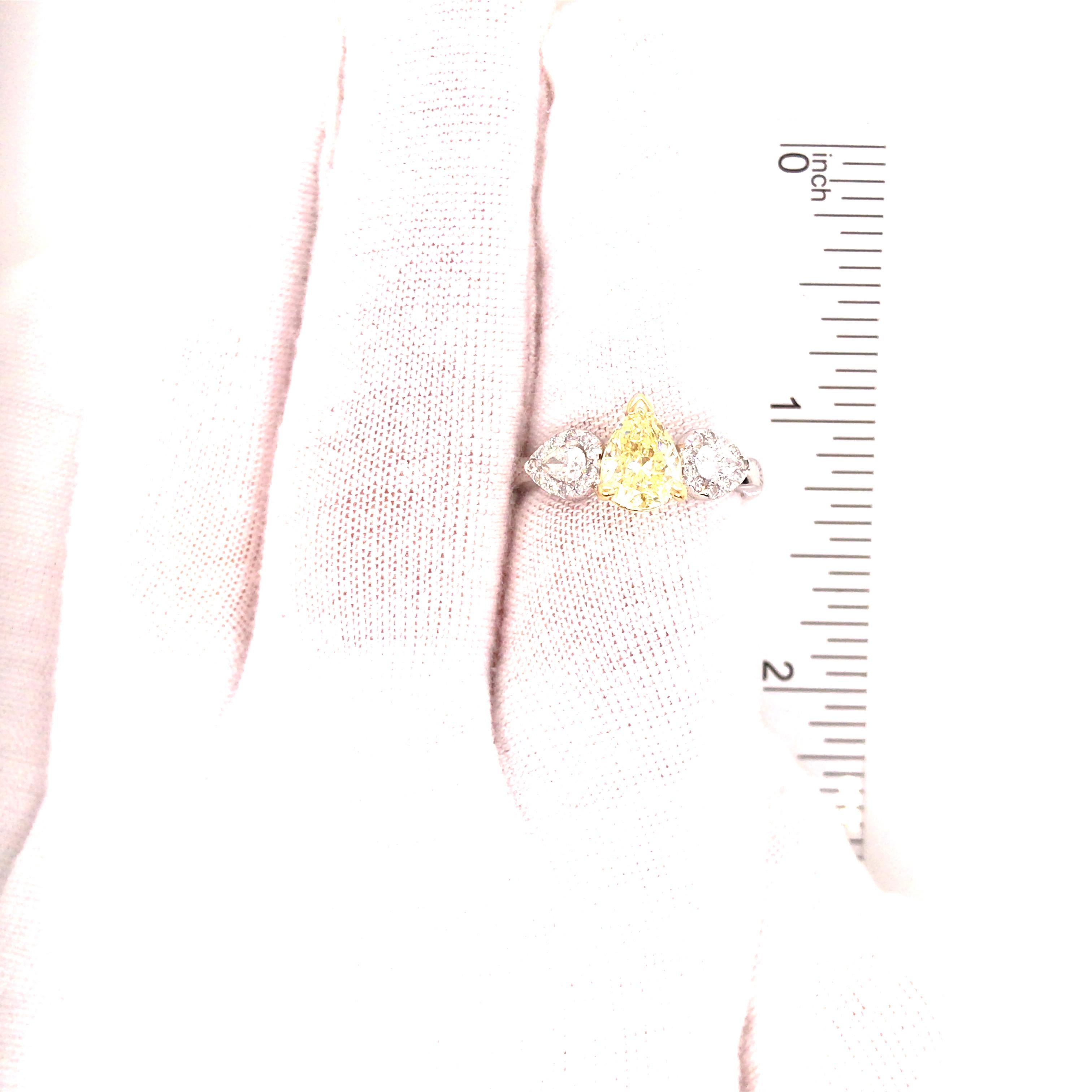 GIA Certified 1.39 Carat Fancy Yellow Pear Shape Diamond 3-Stone Ring 18KTT For Sale 4