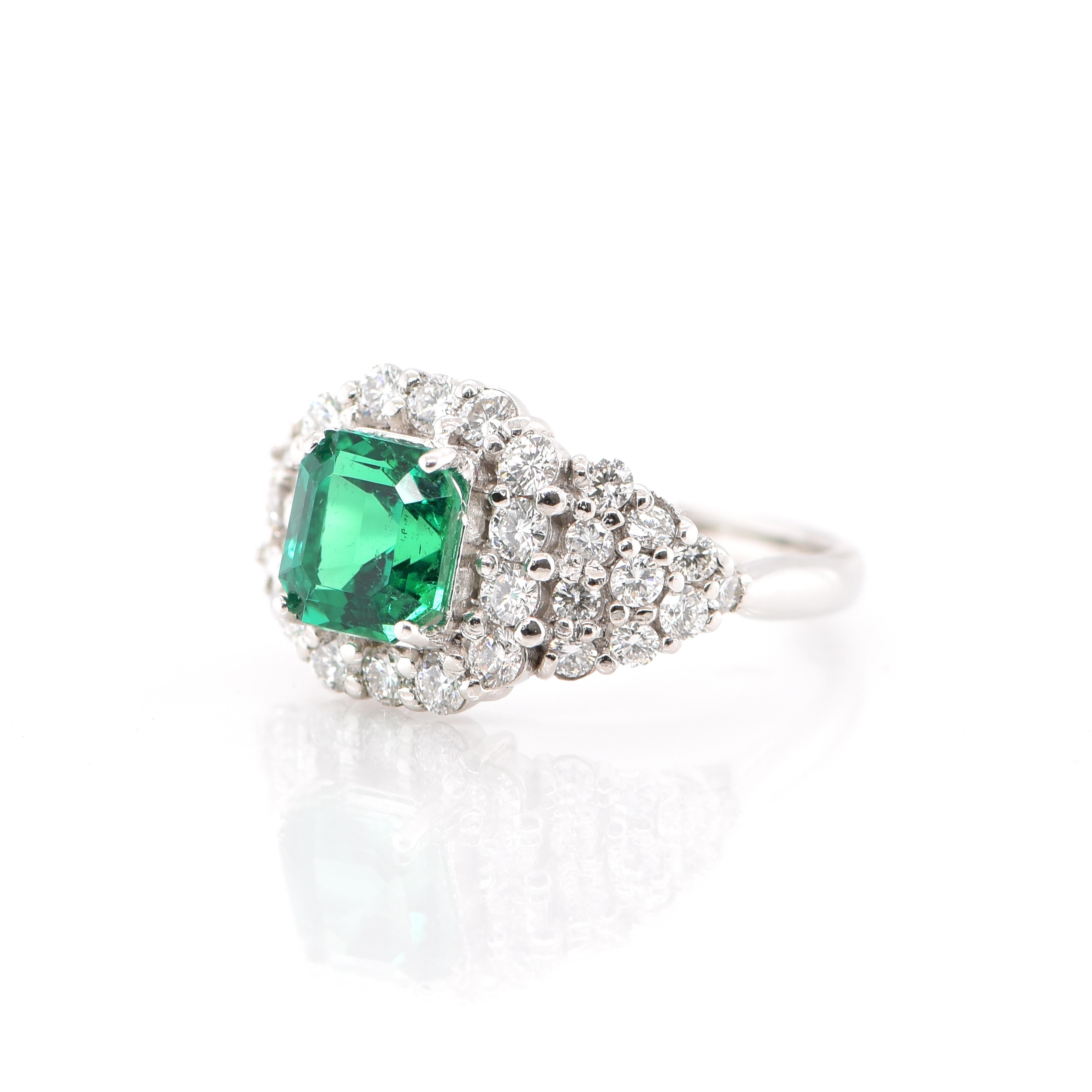 A stunning Engagement Ring featuring a GIA Certified 1.39 Carat Natural, Colombian, only minority enhanced Emerald (GIA #3335792200) and 0.85 Carats of Diamond Accents set in Platinum. The Emerald is eye clean and displays beautiful color! People