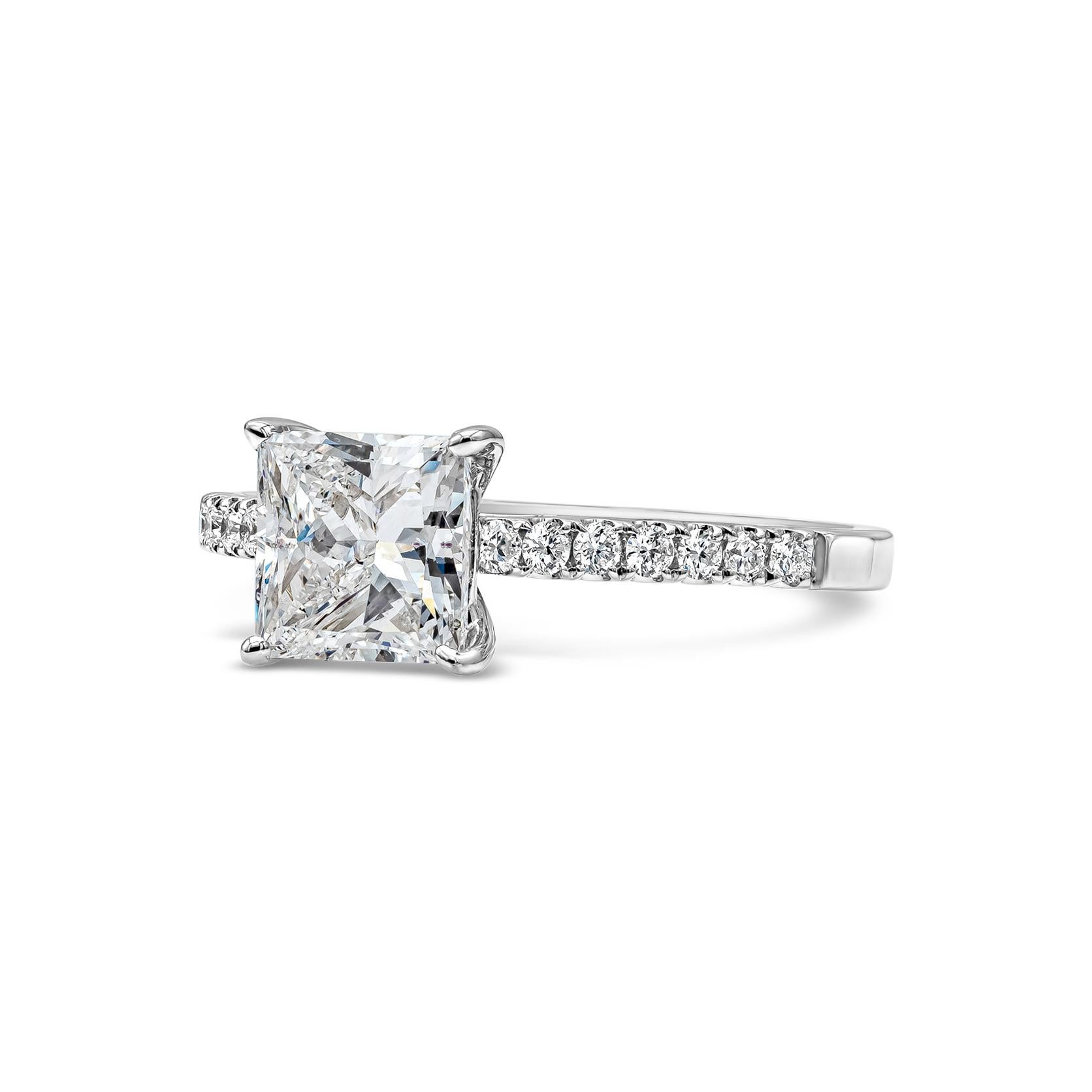 A classic and timeless piece of jewelry showcasing a 1.39 carats princess cut diamond certified by GIA as E color, SI2 in clarity. Beautifully set in a diamond encrusted pave shank made in 18k white gold. Accent diamonds are approximately 0.20
