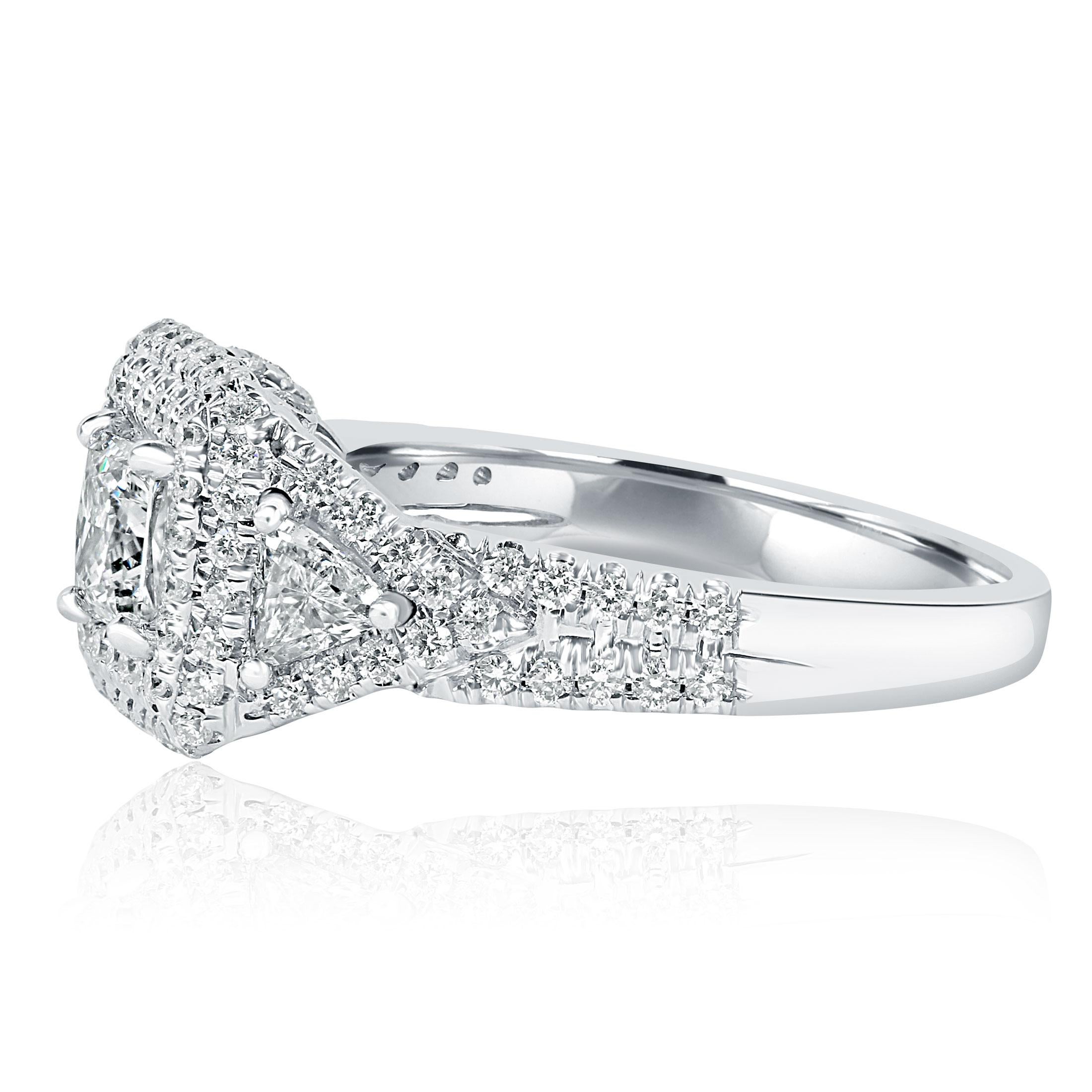 This beautiful one-of-a-kind engagement ring showcases a 0.52 carat GIA-certified princess cut diamond, graded G color and VVS2 clarity, with measurements of 4.48 x 4.43 x 3.25 mm. GIA report number: 5151613533. The stunning centerpiece is elegantly